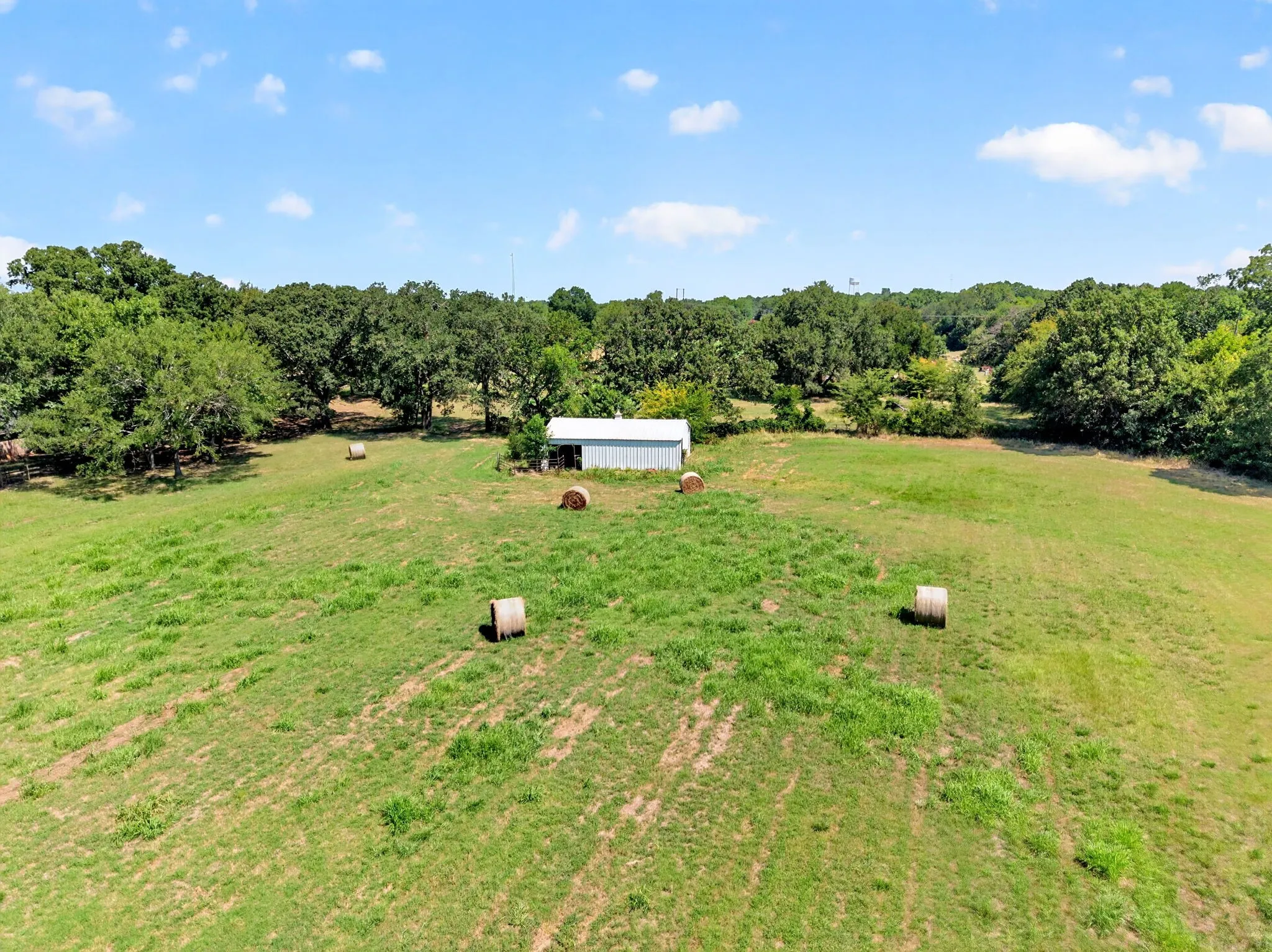 Barn and some of the remaining hay that was baled.