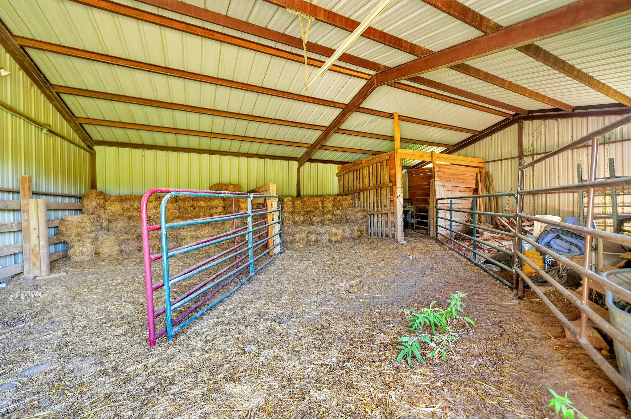 Plent of room to store hay, feed, or for use as a stable.