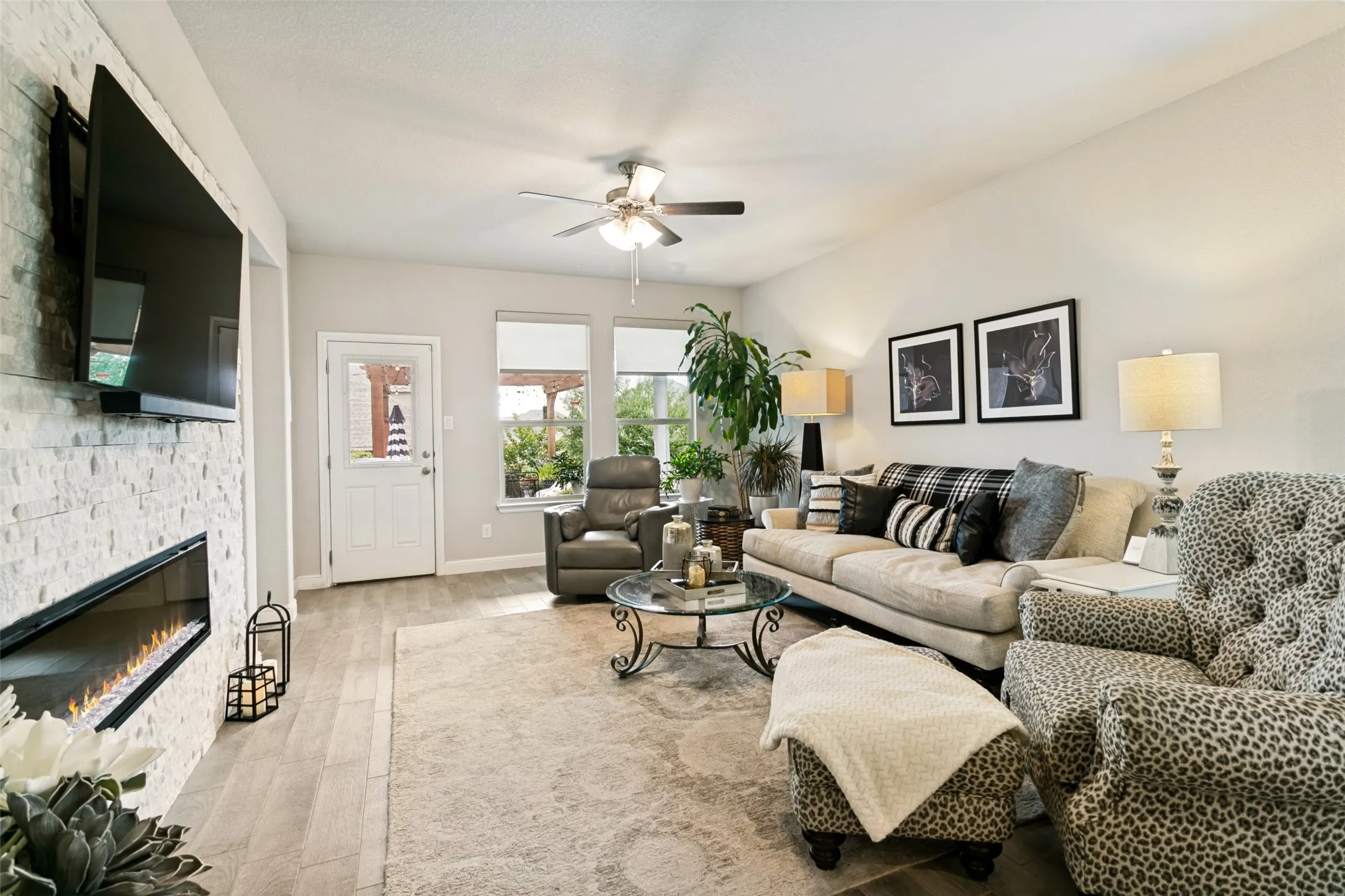 Family Room with Feature Wall on left with Electric Fireplace and TV