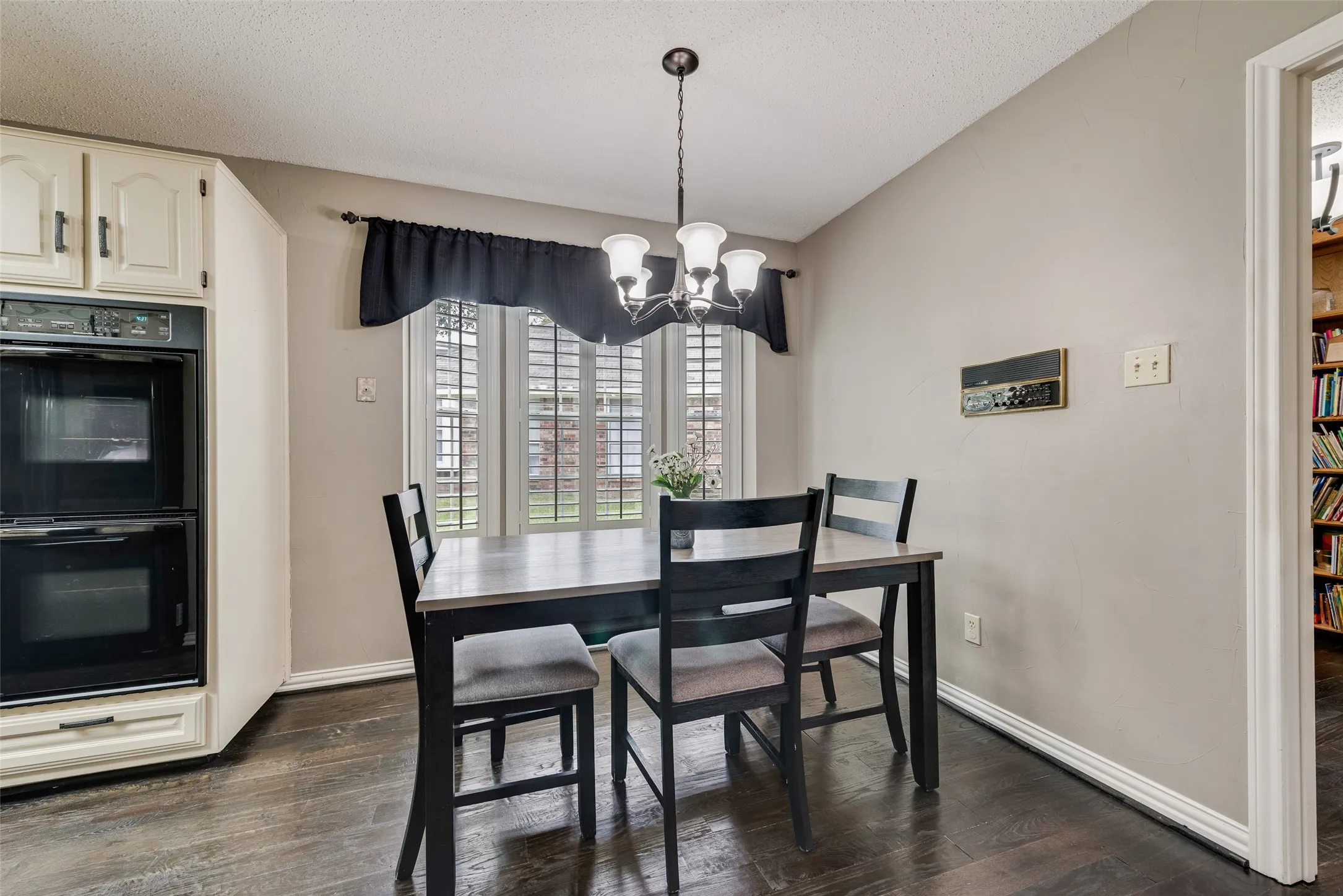 Breakfast Area with real hardwood flooring!