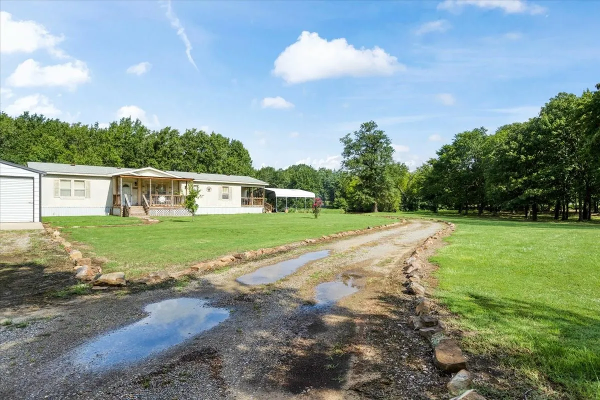 Mobile Home For Sale in Fannin County , 1022 County Road 2295, Telephone, Texas 75488, 3 Bedrooms, 2 Bathrooms, Garage spaces, 1,904 Sqft, built in 2001, Price $260,000, mls#21334749, Real Estate Agent in Telephone, Homes For Sale in Fannin county, Homes For Sale in Telephone, Realtor in Telephone Texas, Real Estate Brokerage Independent Realty Texas, Luminita Cordes Realtor