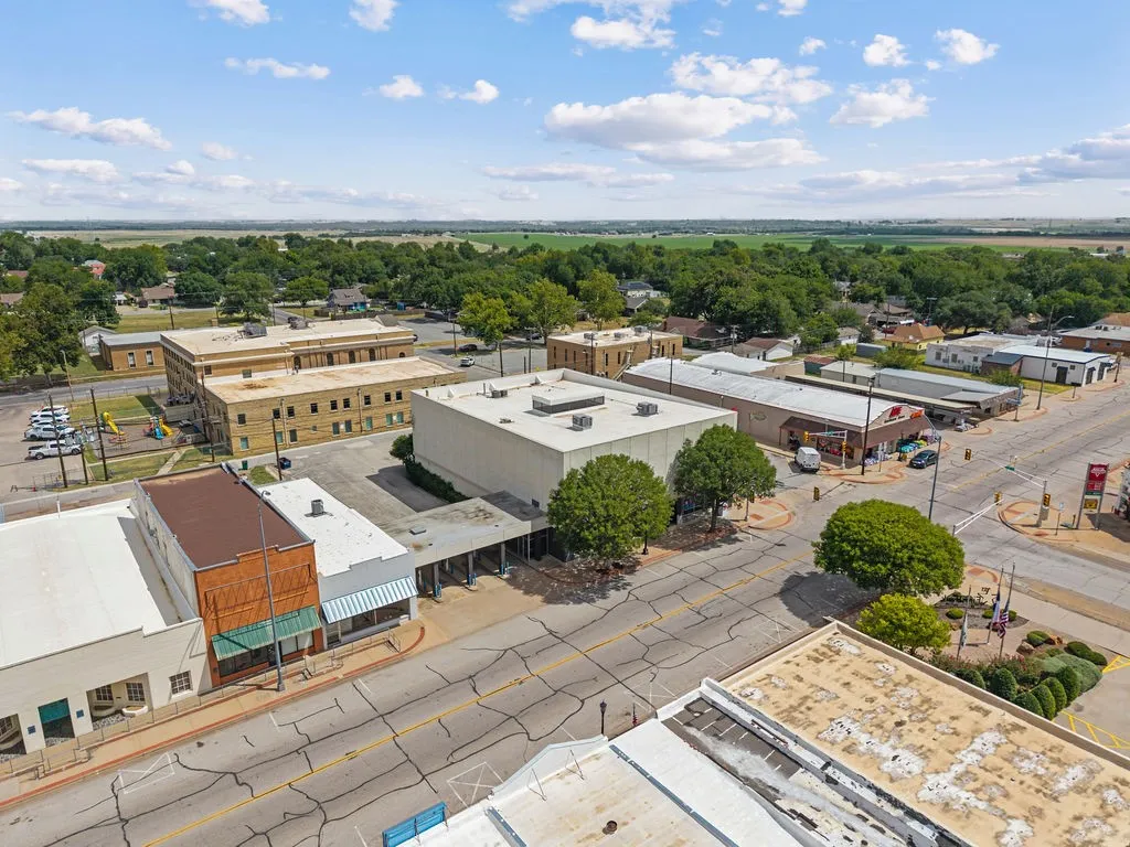 Commercial district featuring multiple storefronts and established buildings