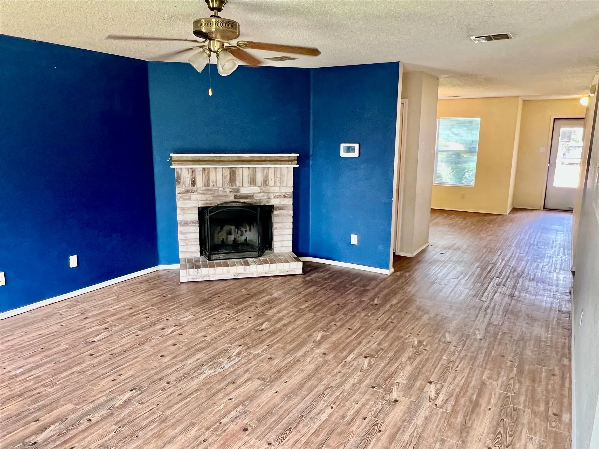 Living room with view of Fireplace