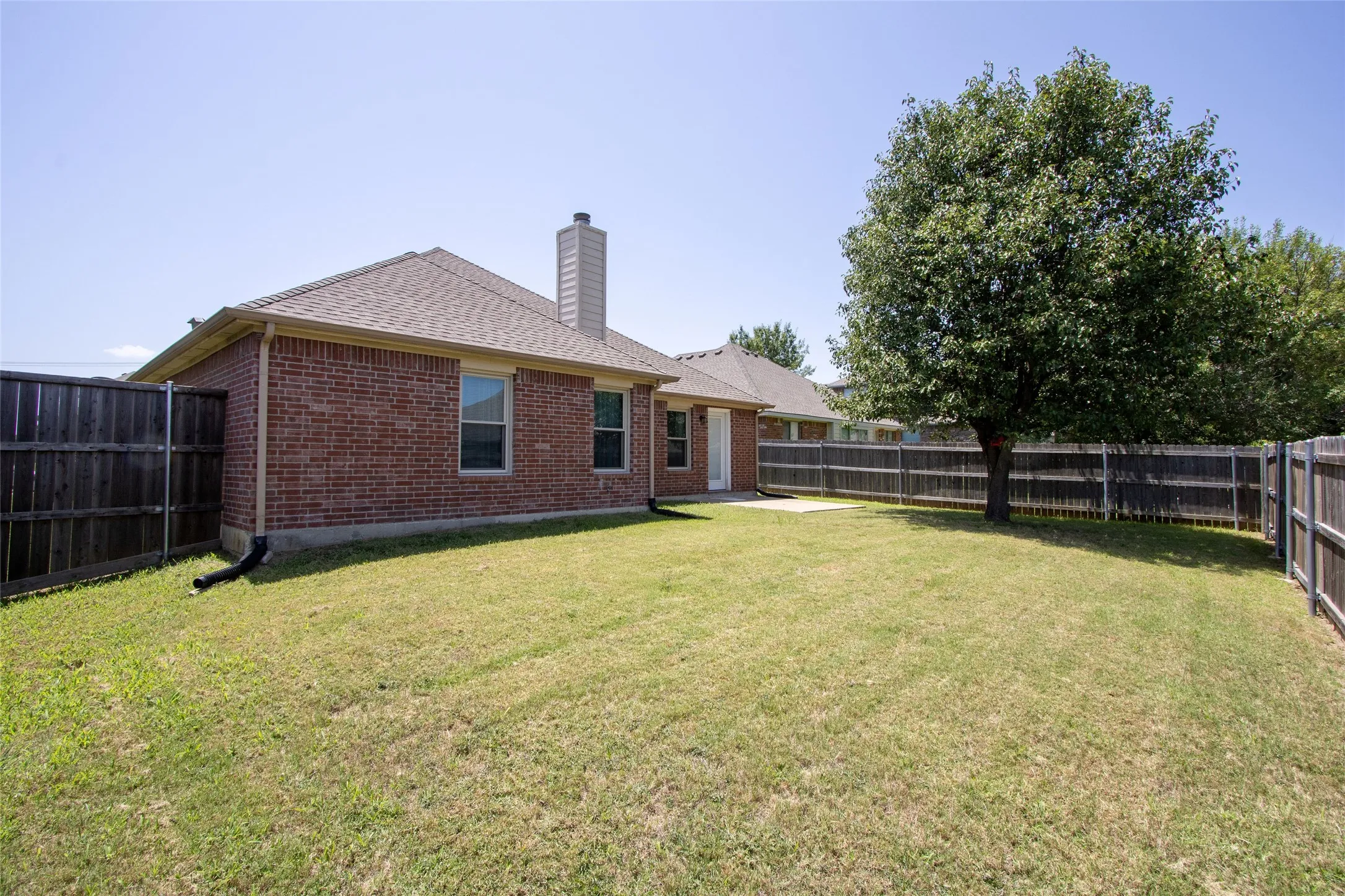 Back view of 1613 Cowtown, Mansfield
