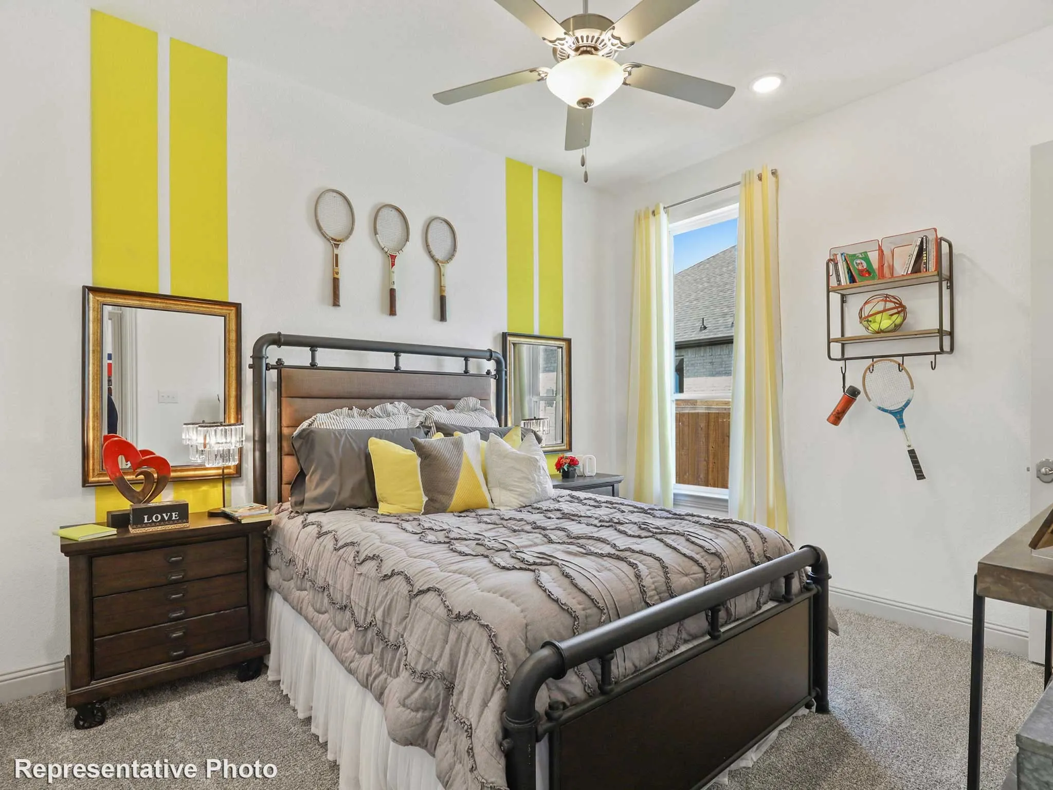 Carpeted bedroom featuring a ceiling fan with integrated lighting, a large window, and recessed lighting
