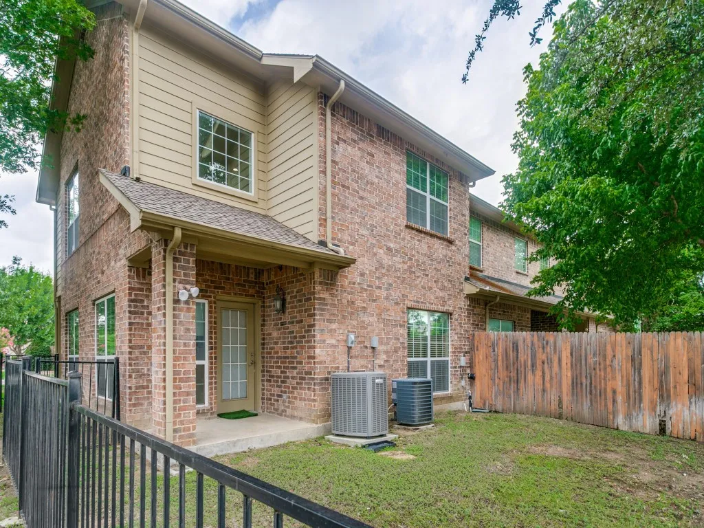  2 zoned A/C units and small fenced backyard