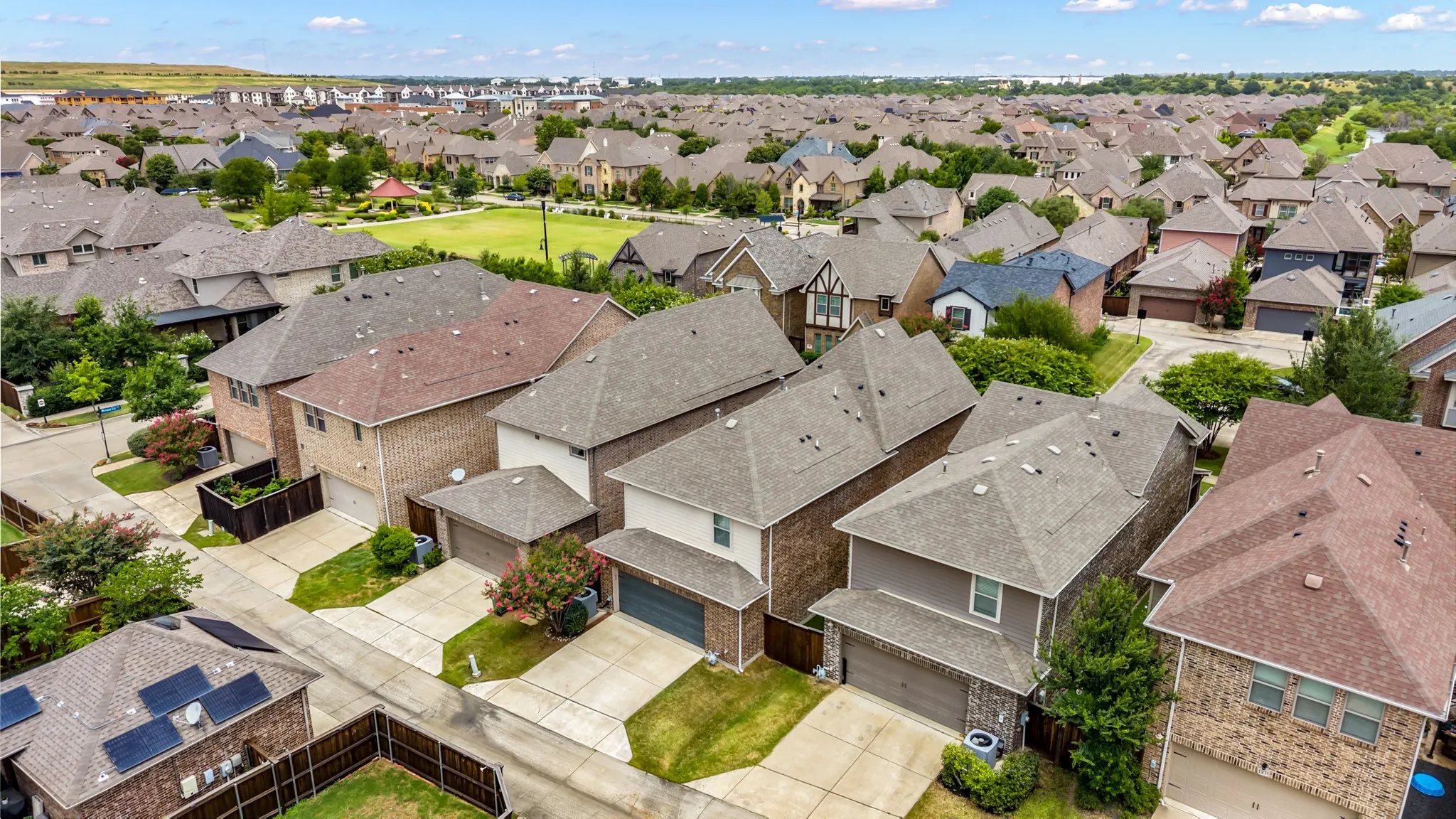 Aerial perspective showcasing a residential neighborhood with varied architectural styles