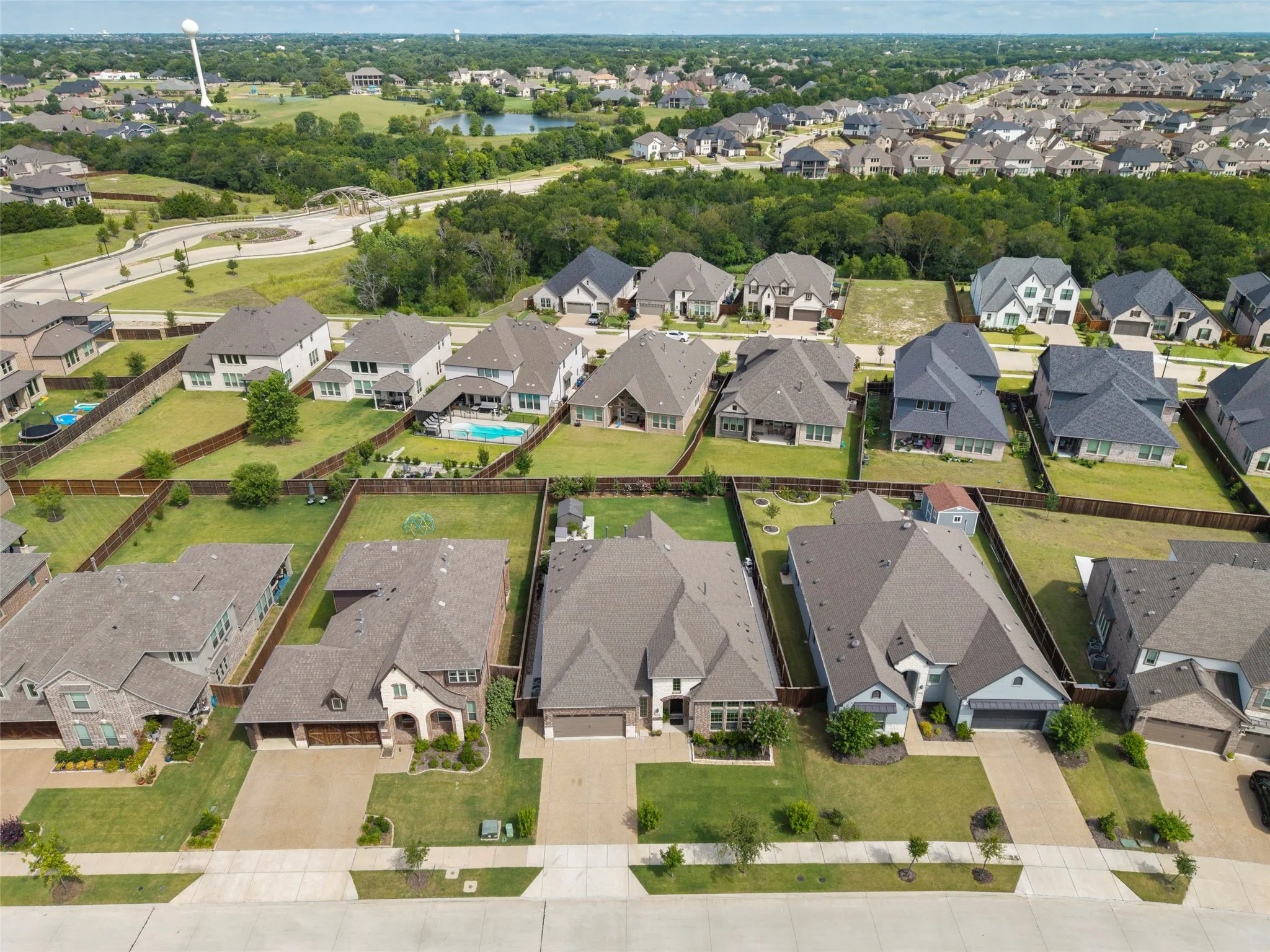 Aerial perspective highlighting a residential community with varied architectural styles