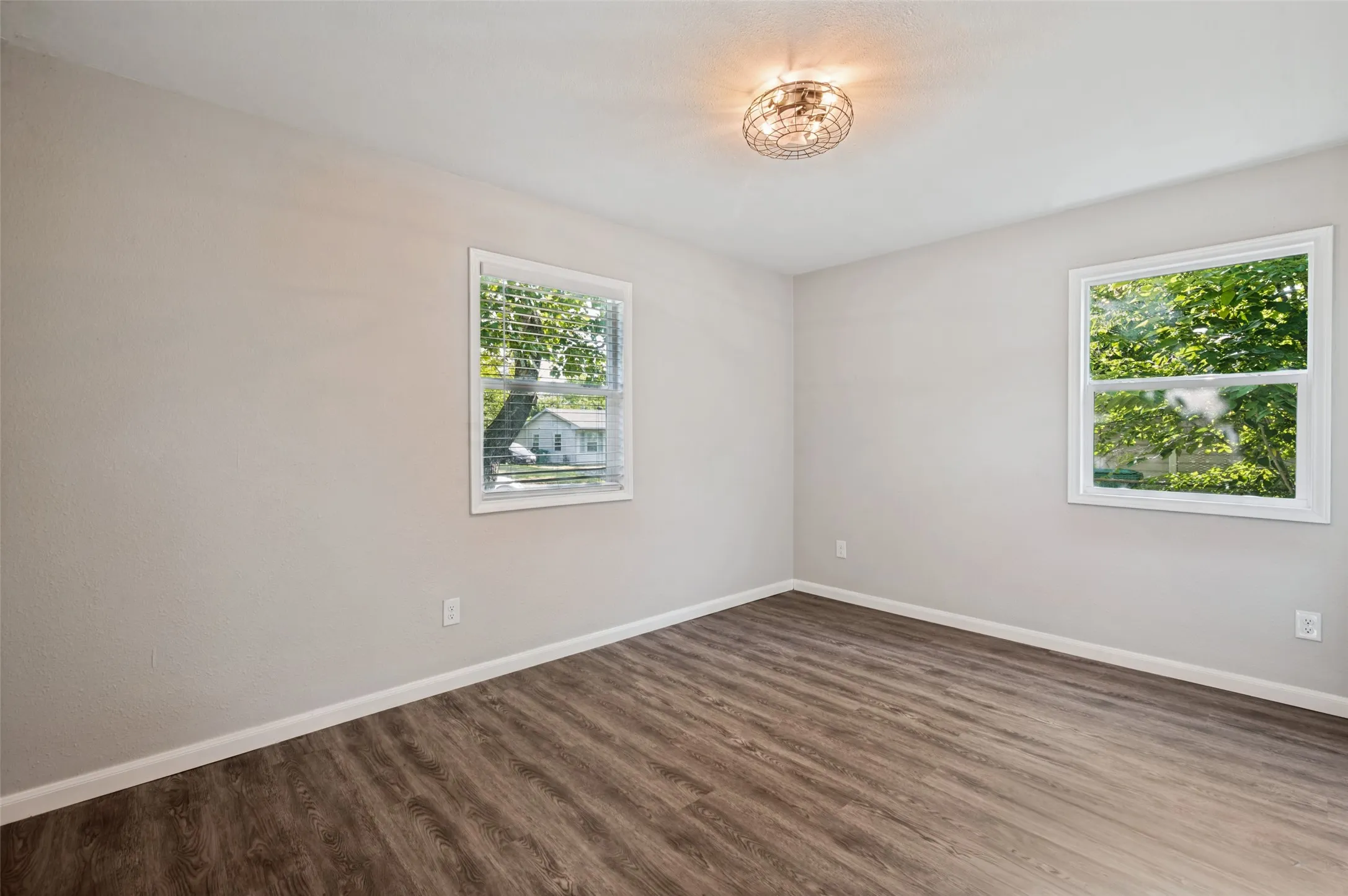 Guest Room has new windows and shade trees all around.