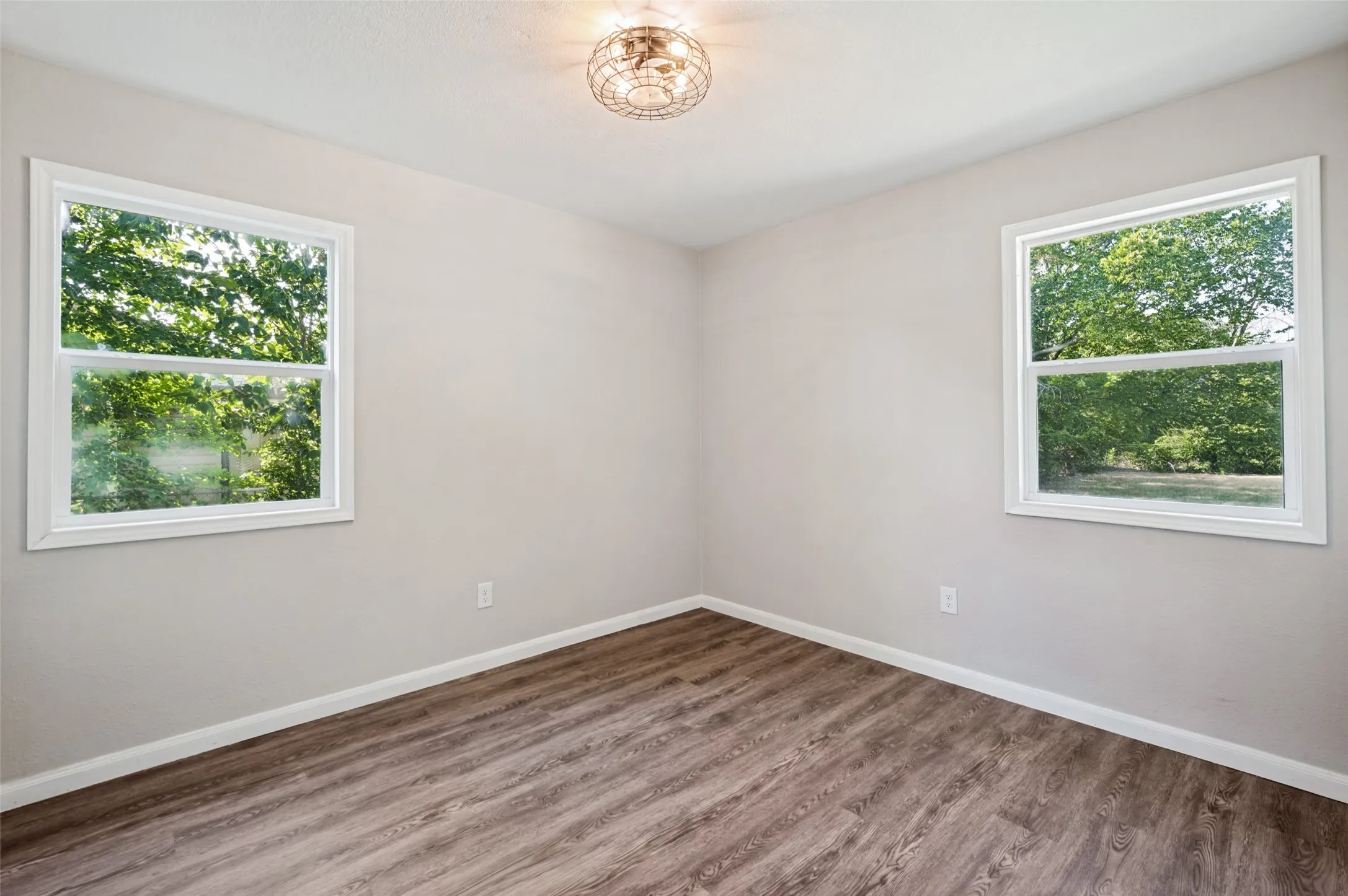 Second Guest Room with new windows and looks to the backyard.