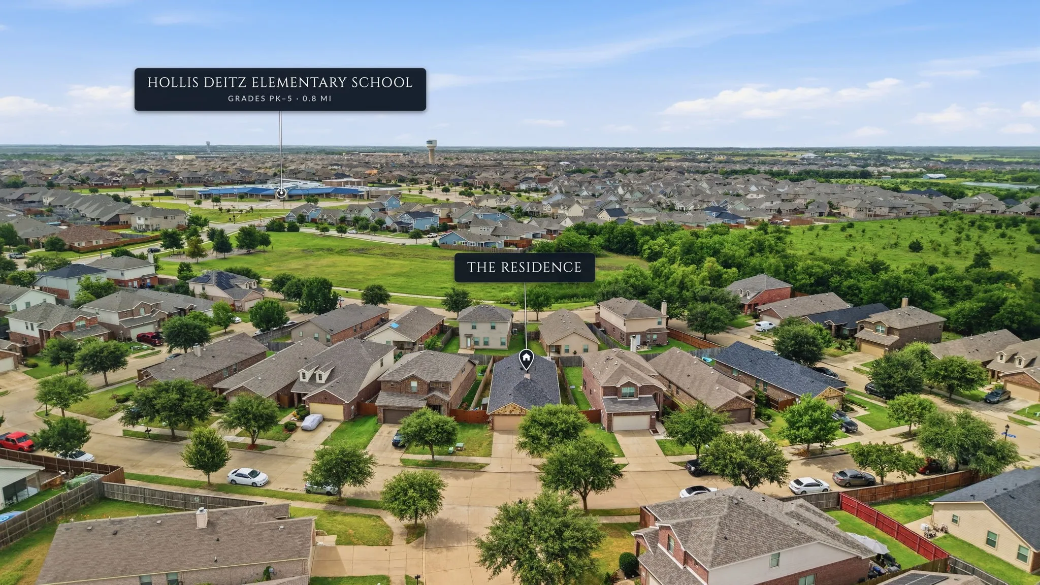 Aerial perspective of a residential neighborhood with numerous single-family homes