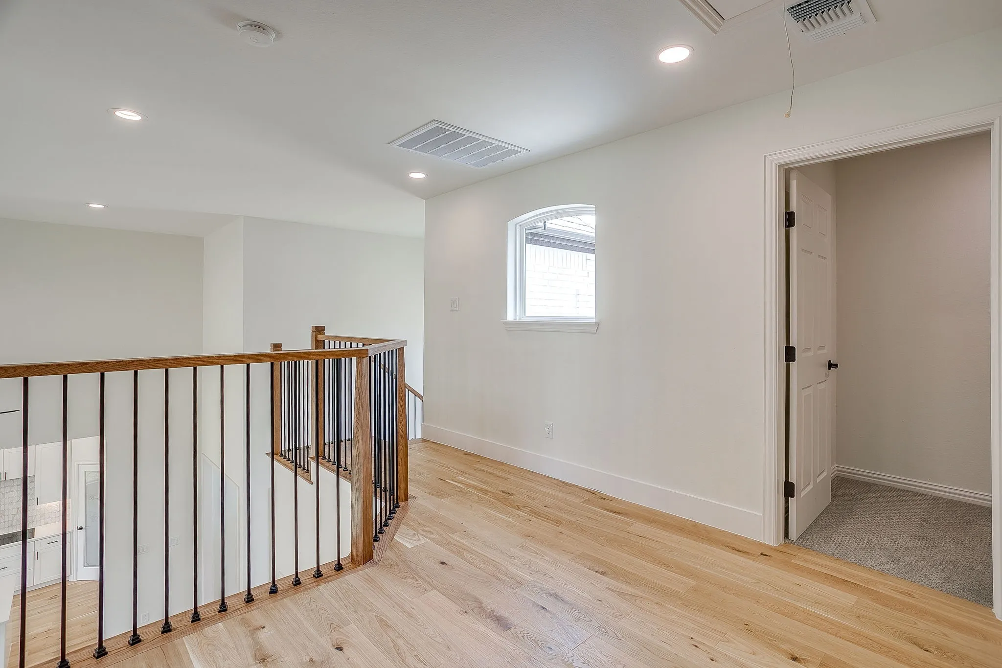 Landing loft area at top of staircase.