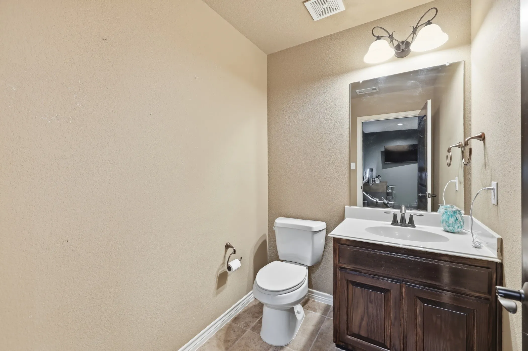 Upstairs half bathroom.