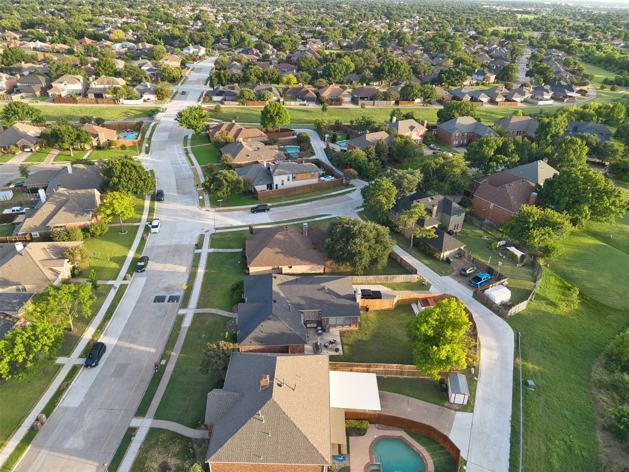 Residential neighborhood featuring mature trees and established homes