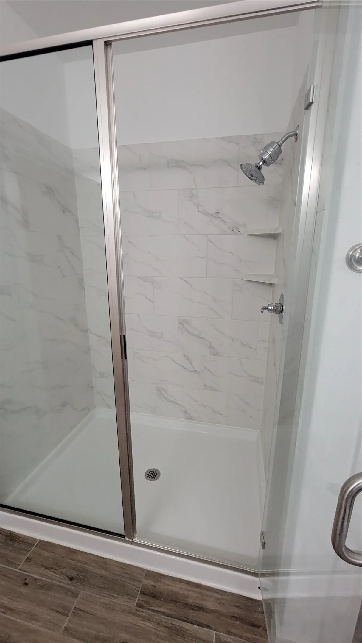 Bathroom with an enclosed shower