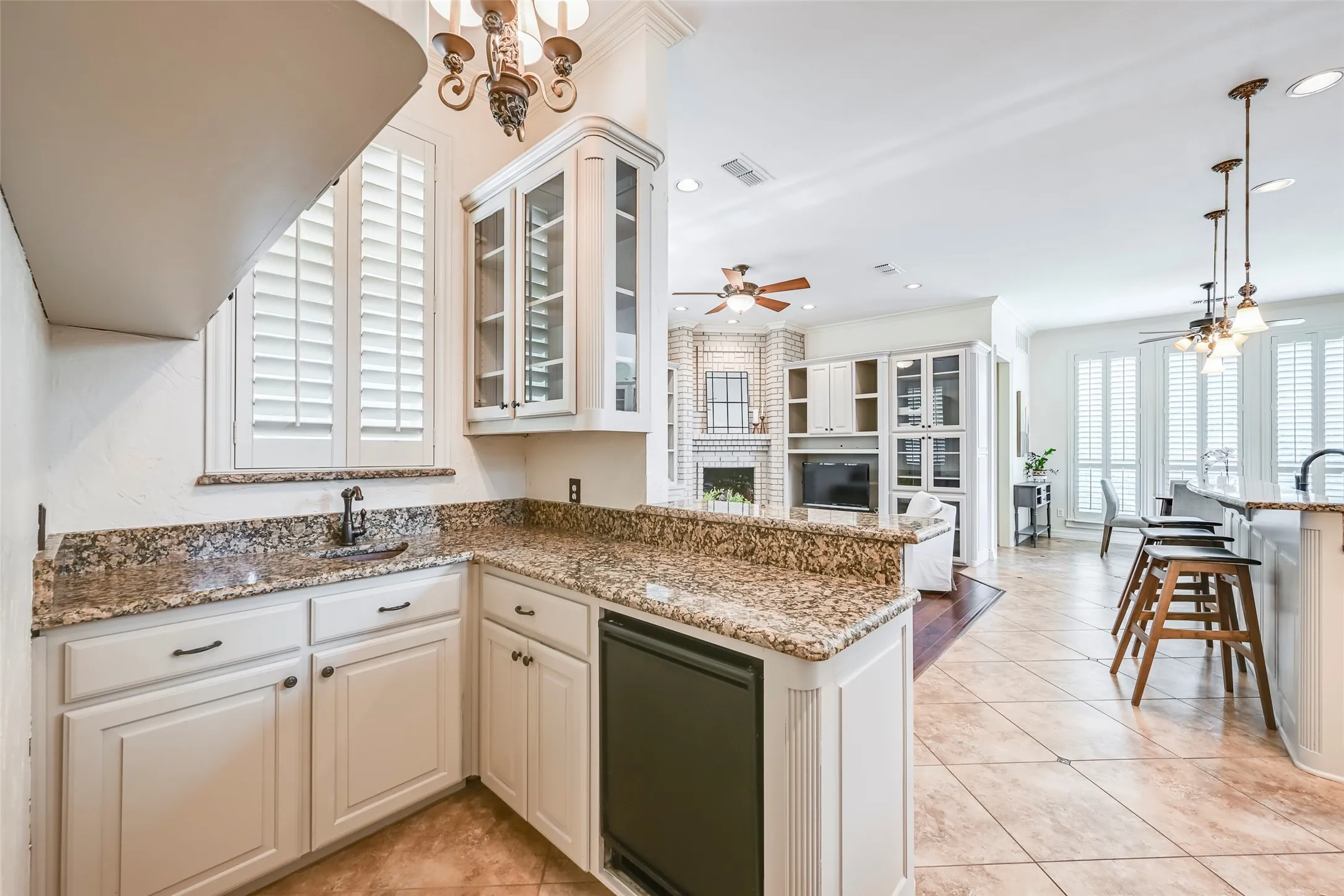Secondary sink in kitchen area to set up your morning coffee bar/store your wine and bar items.