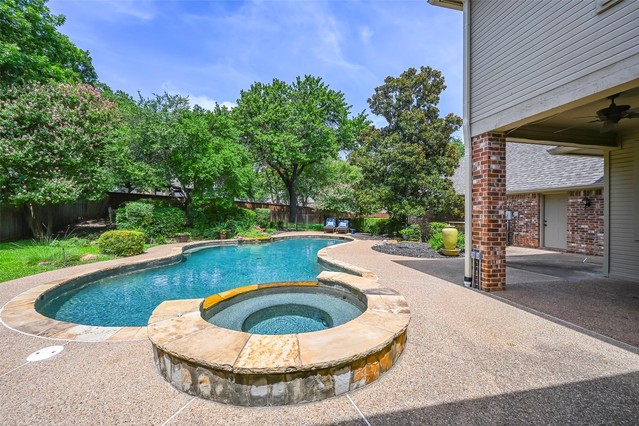 Rock waterfall feature at the rear of the pool provides perfect sound & visual tranquility.