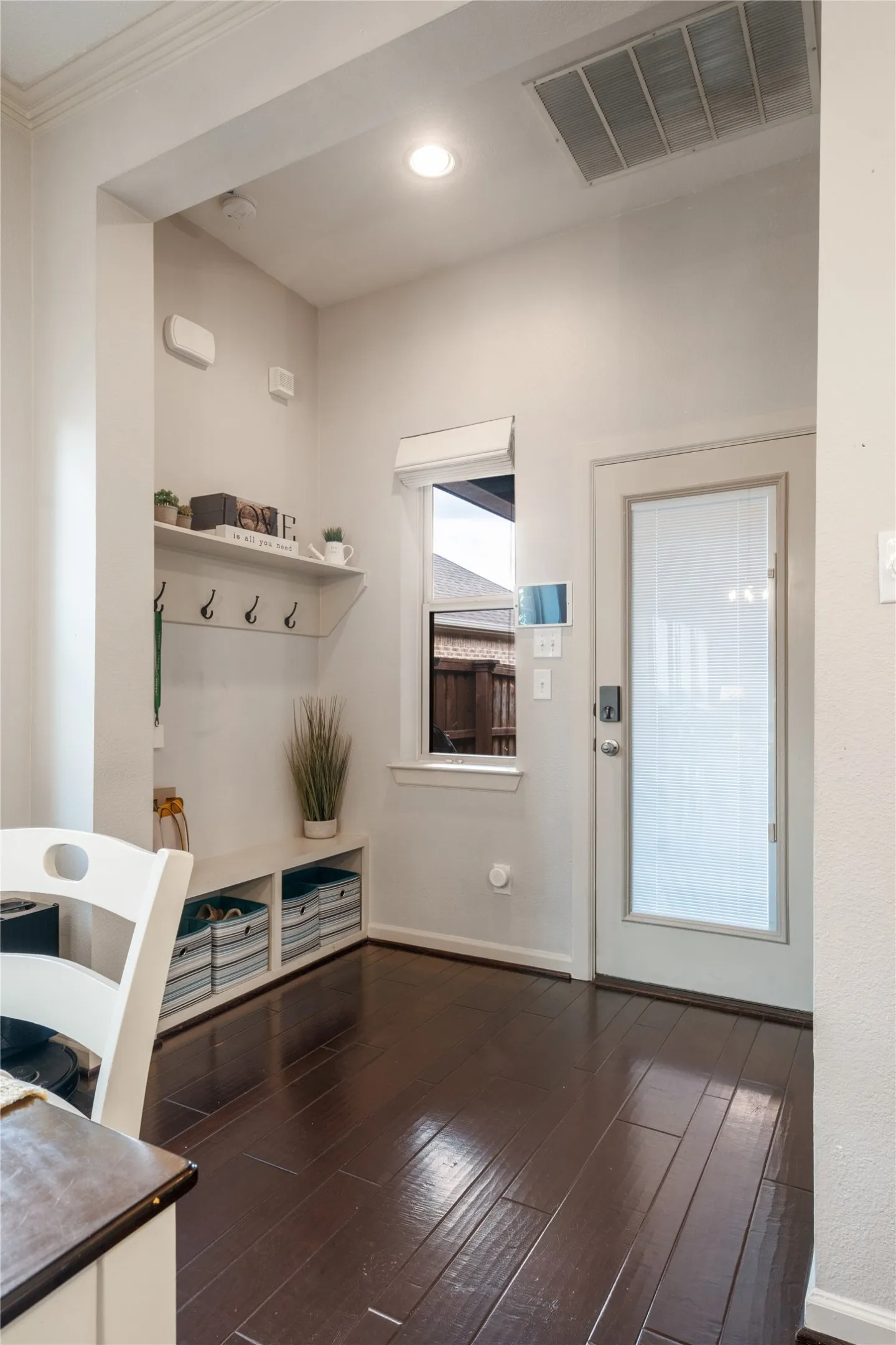 Leave your boots and jackets at the mudroom just inside the back entrance to the covered patio or the double car garage.