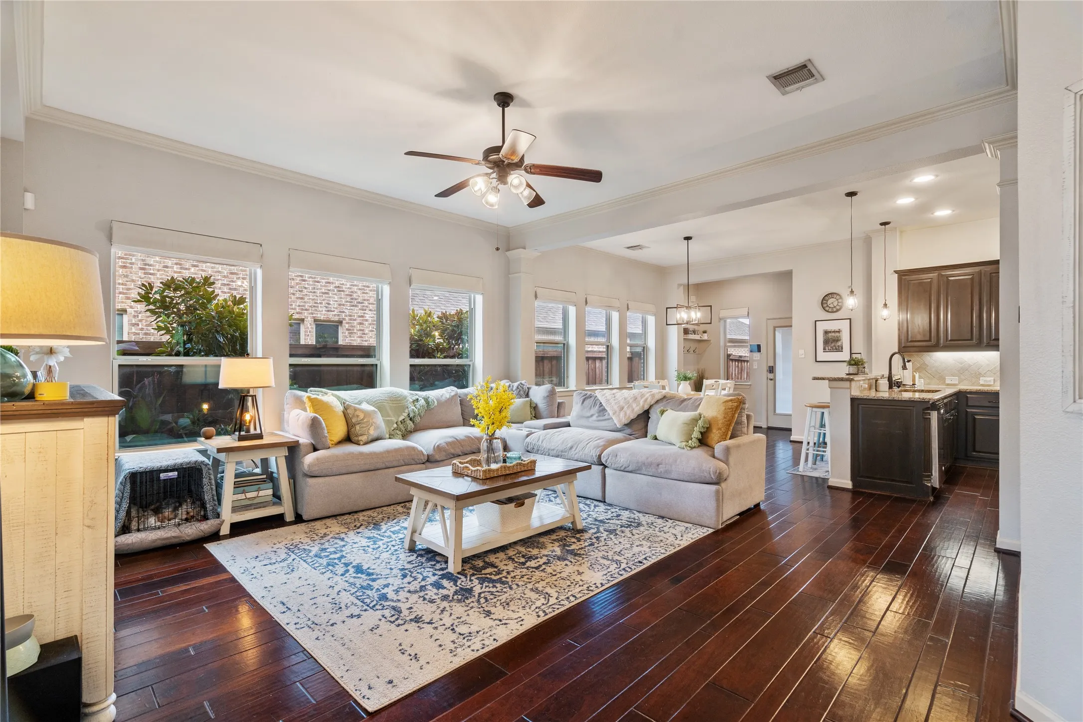 Bright and airy family room that opens to kitchen and dining areas.