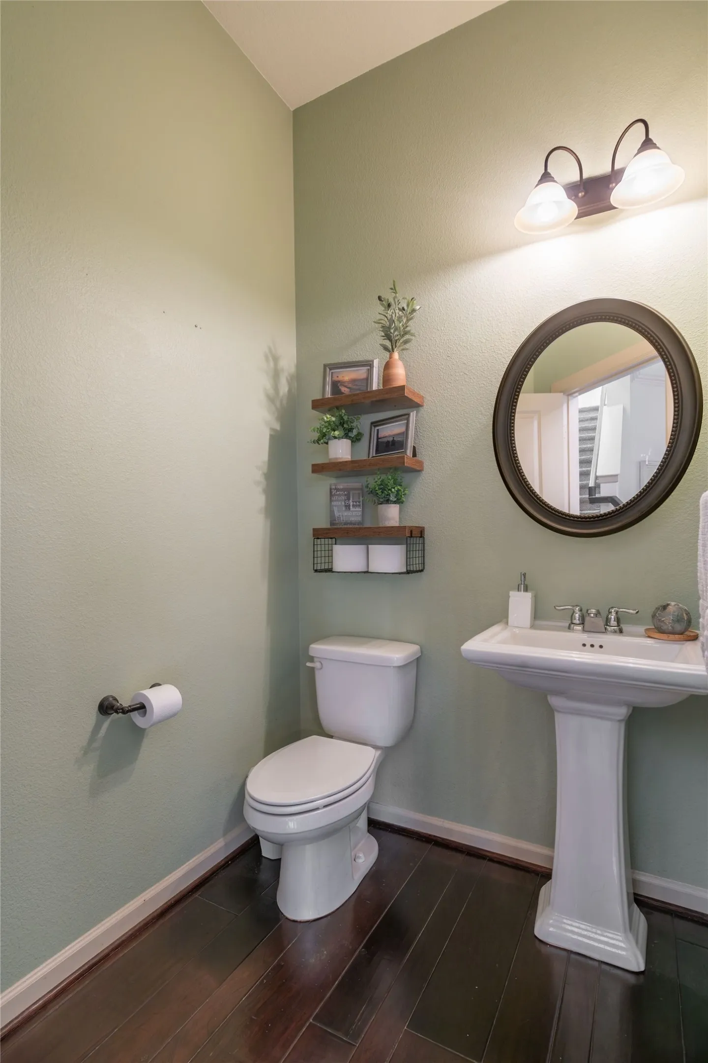 Powder bath just off the entry down stairs.