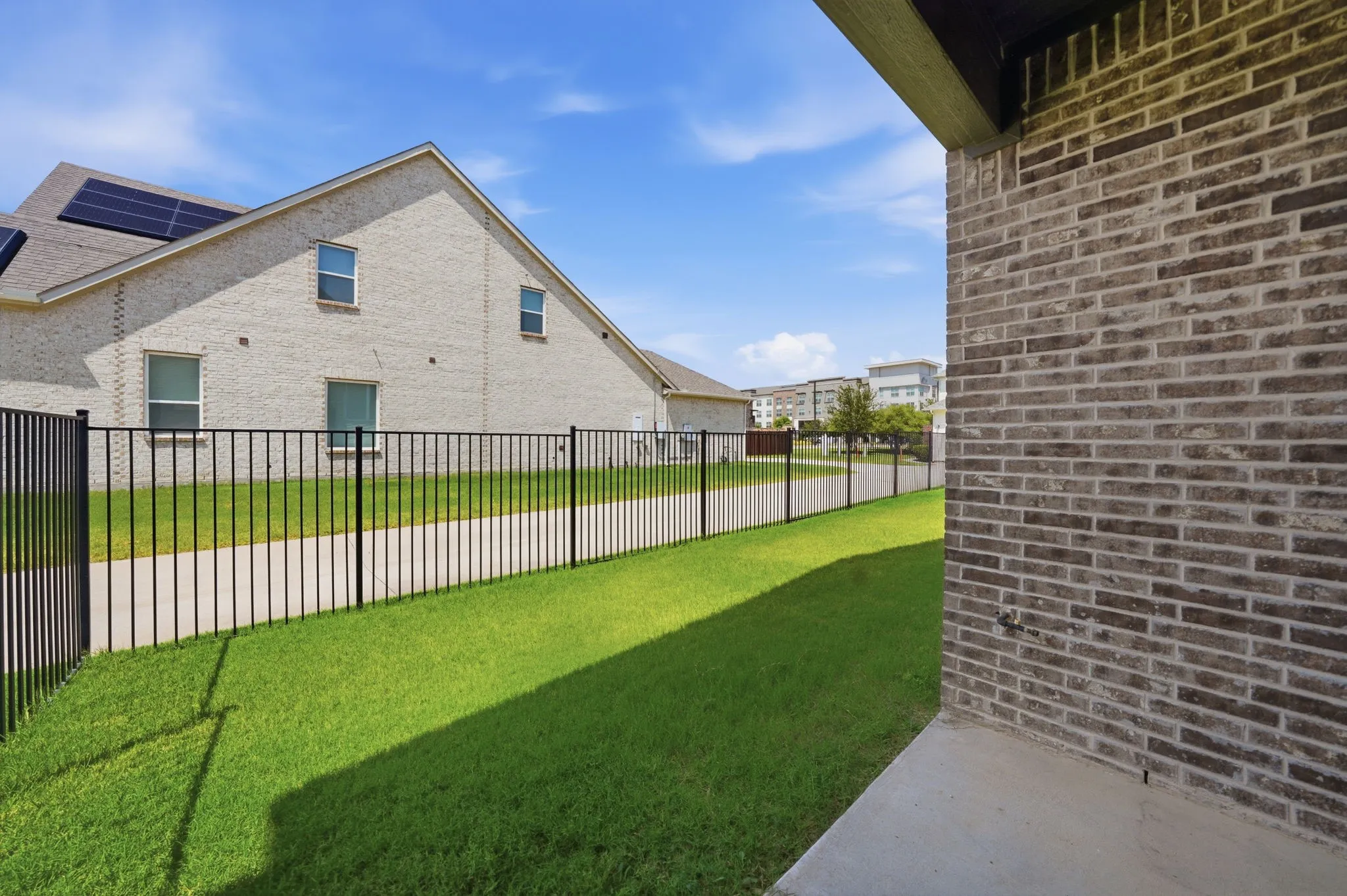 Covered patio and side yard