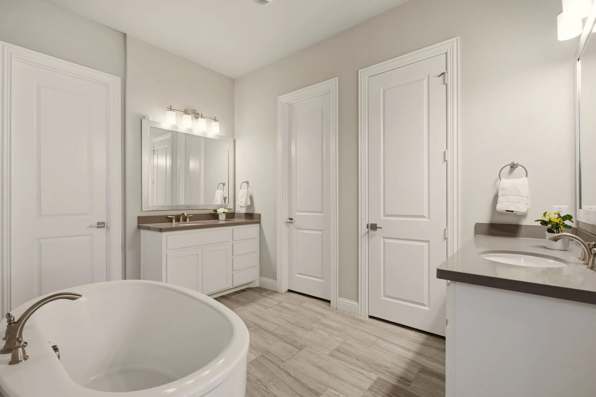 Ensuite with Two Vanities and Soaking Tub.