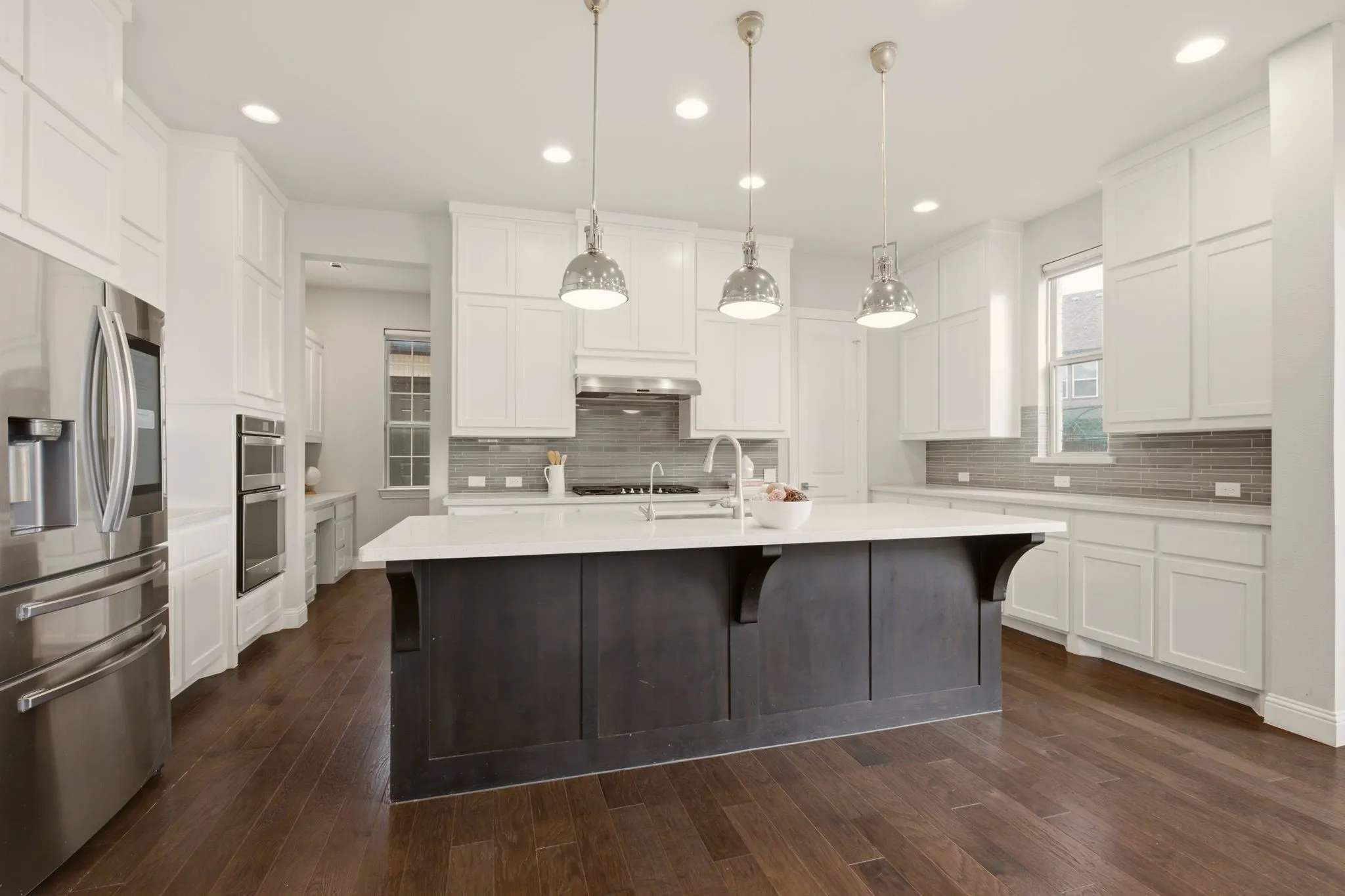 Spacious Kitchen opens to Living Area.