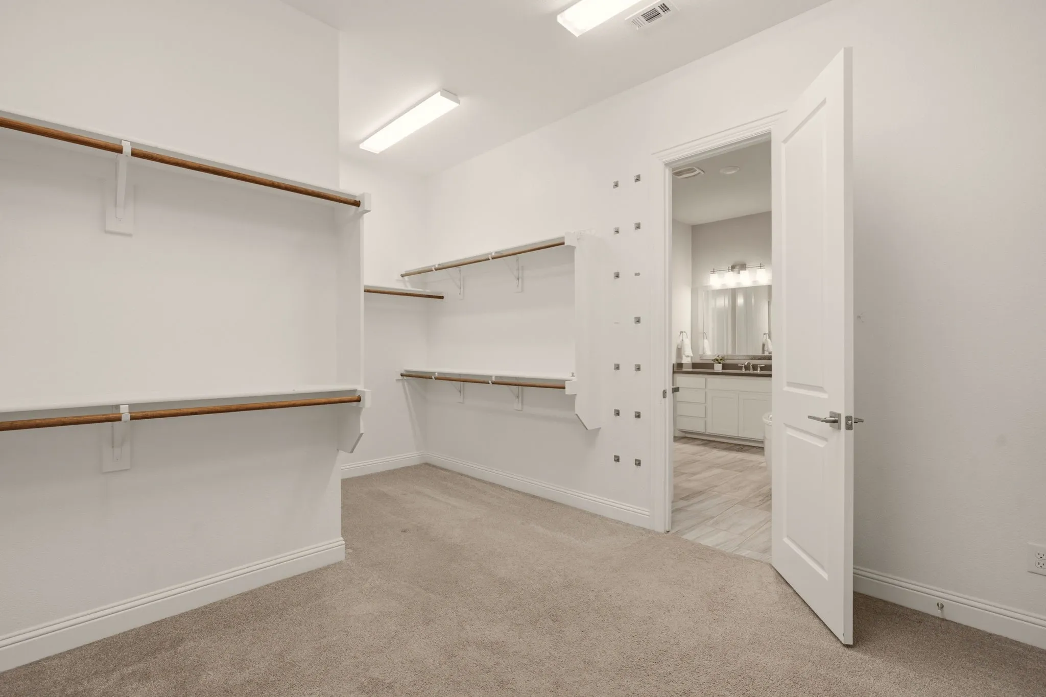 Primary Closet Attaches to Bathroom and Laundry.