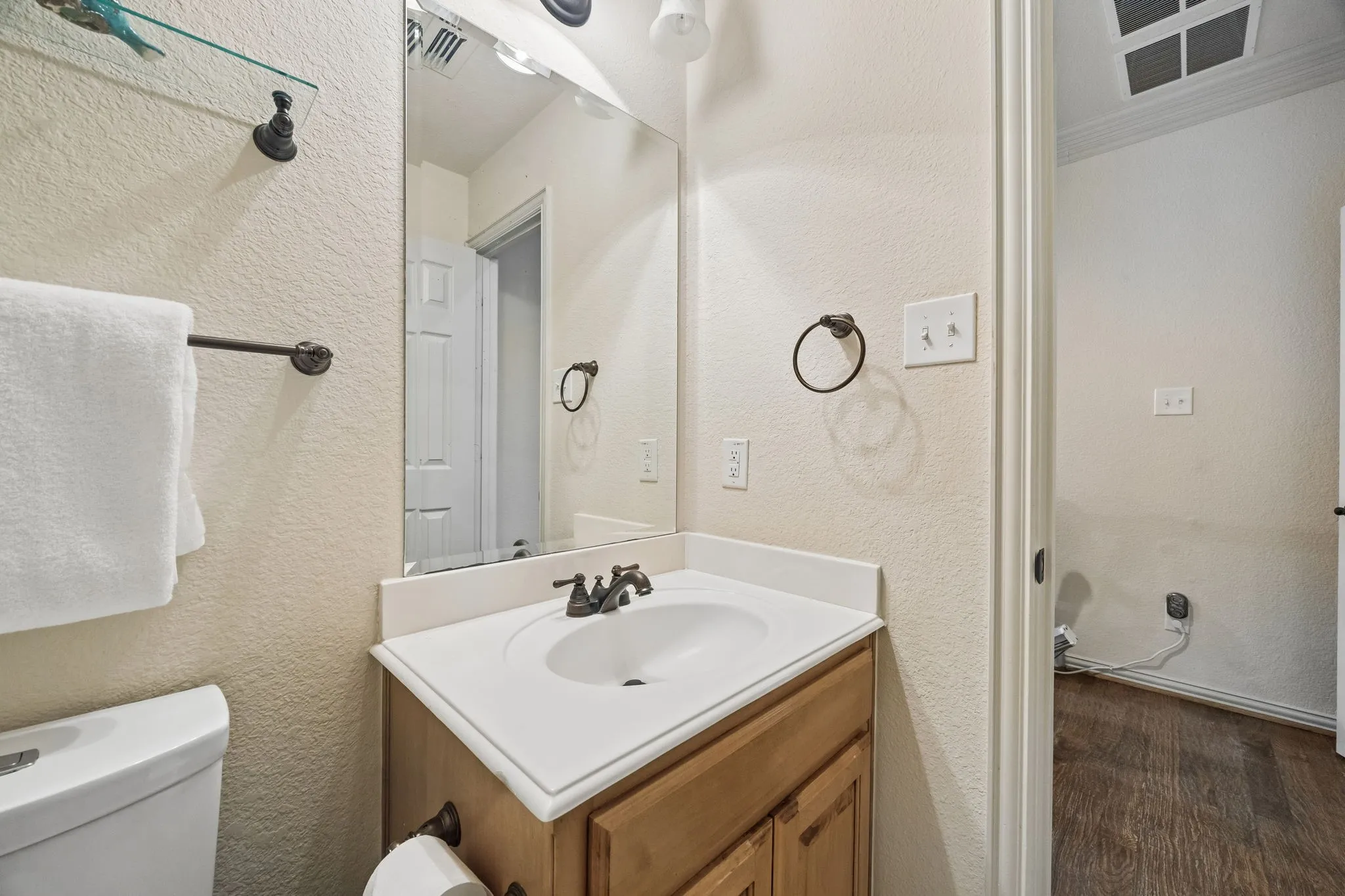 Half bath off upstairs living space (there is space available for expansion to full bath)
