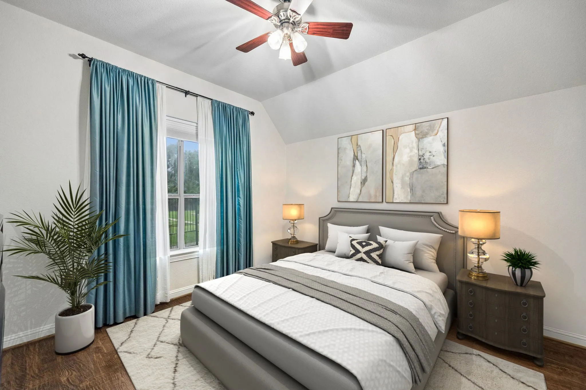 Split secondary bedroom with ceiling fan, hand
scraped hardwood flooring and en suite bathroom.