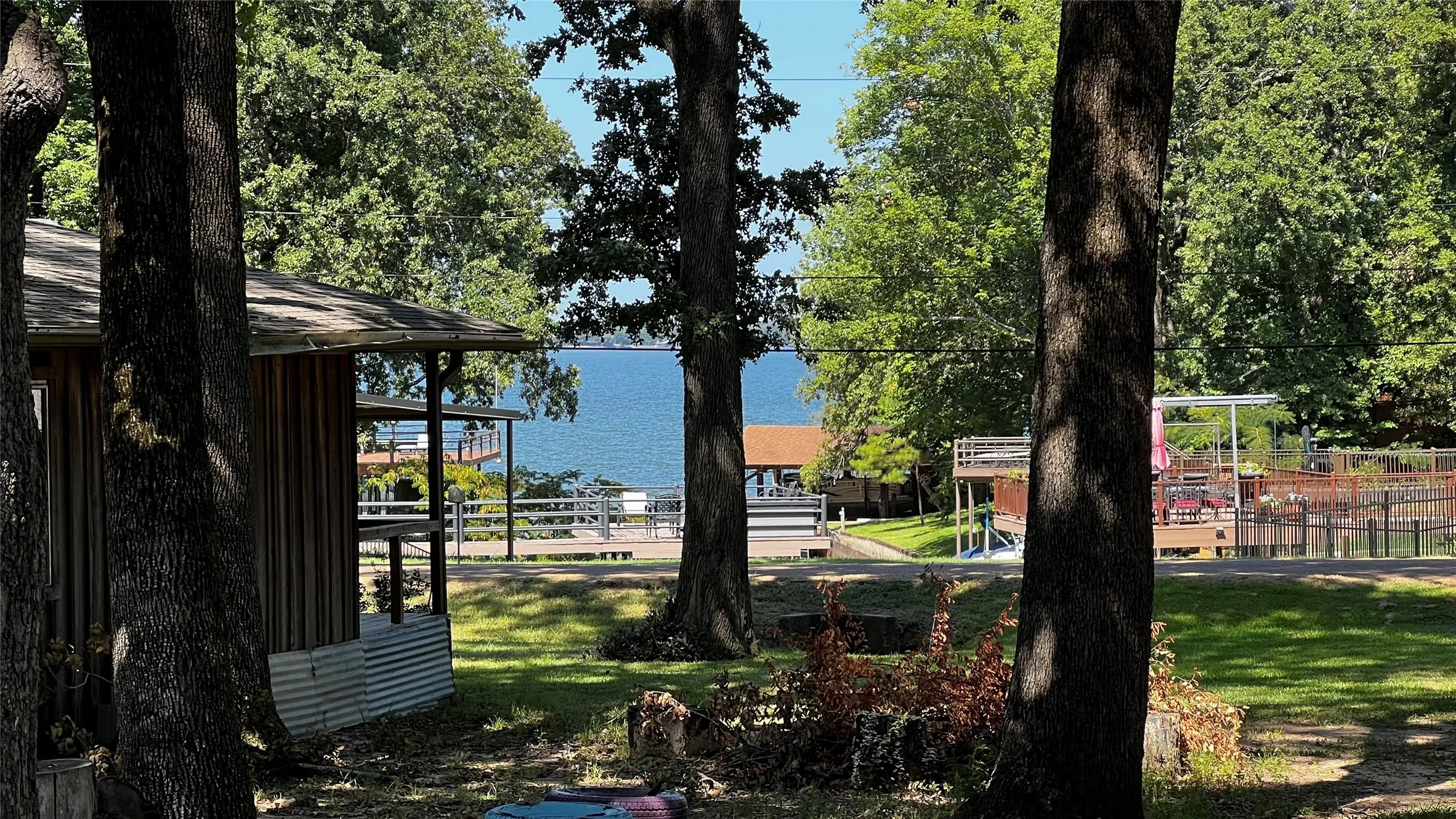 Lake view from the downstairs covered patio carport