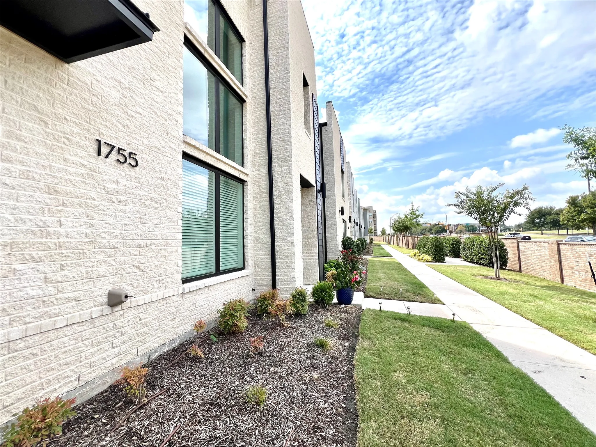 View of home's exterior with a lawn