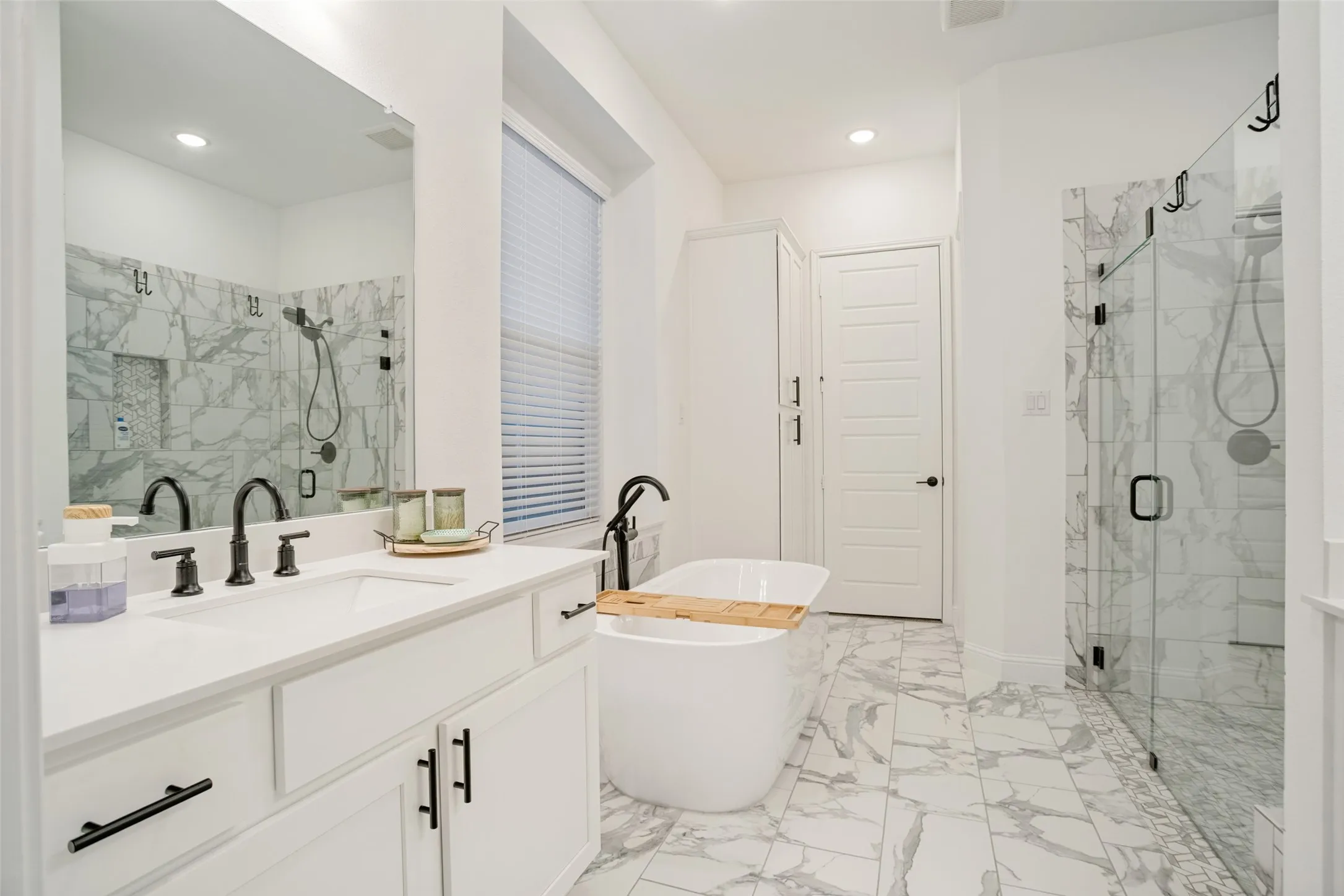 Bathroom big enough to play baseball in.
