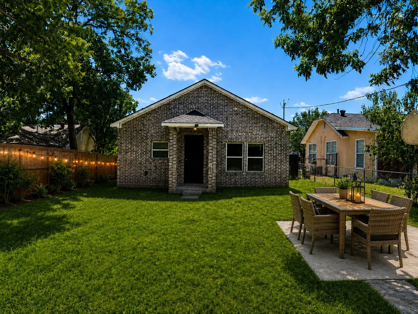 Brick exterior with dark trim windows