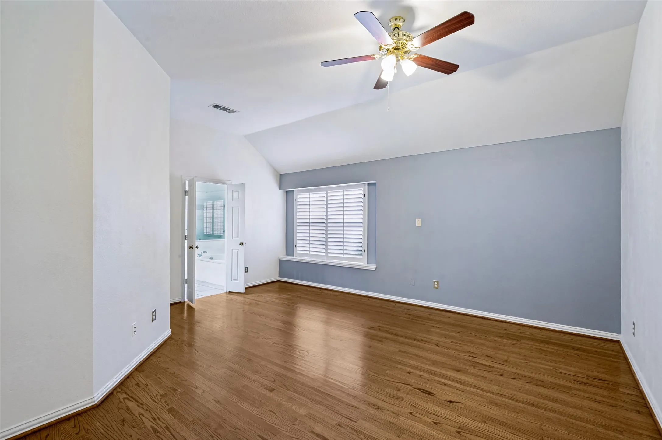 Tall Ceilings and french doors to bathroom