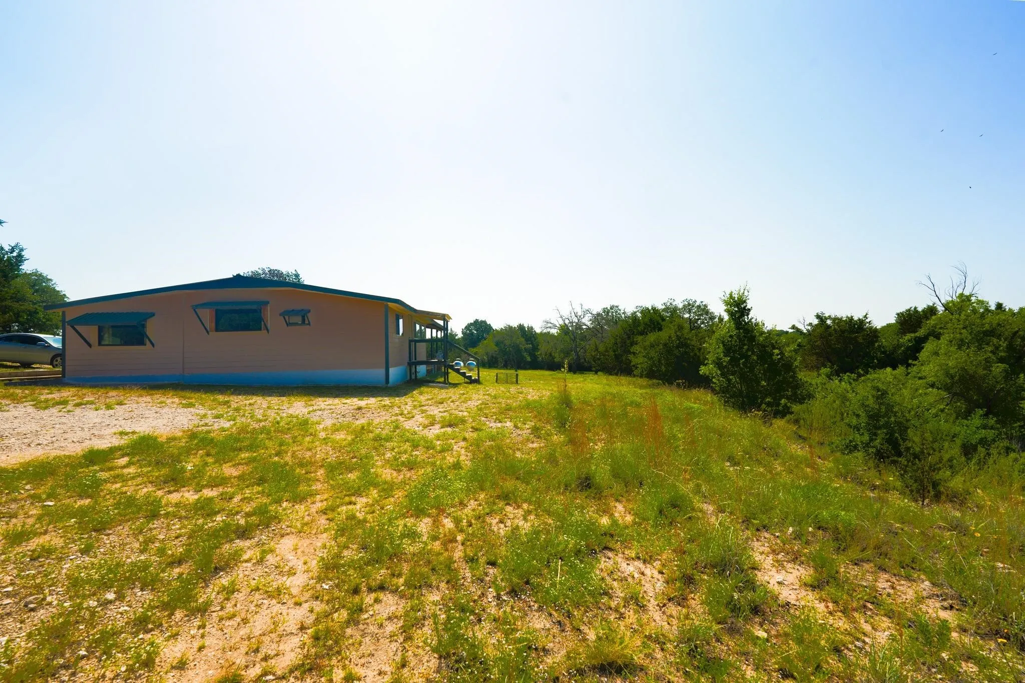 Manufactured Home For Sale in Brown County , 710 Whispering Oaks Lane, Early, Texas 76802, 3 Bedroom, 2 Bathroom, 4 Garage spaces, 1,508 Sqft, built in 1980, mls#21335270, Real Estate Agent in Early, Homes For Sale in Brown county, Homes For Sale in Early, Realtor in Early Texas, Real Estate Brokerage Independent Realty Texas, Luminita Cordes Realtor