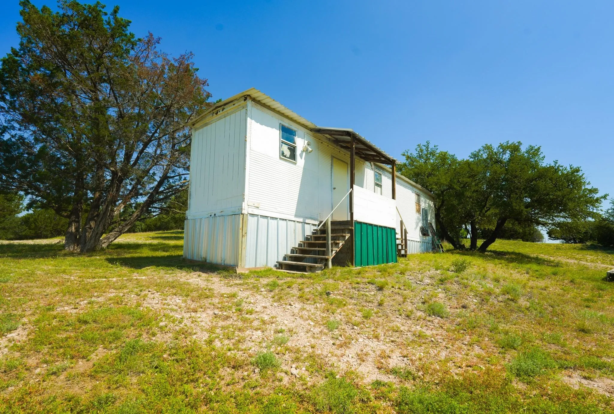 Manufactured Home For Sale in Brown County , 710 Whispering Oaks Lane, Early, Texas 76802, 3 Bedroom, 2 Bathroom, 4 Garage spaces, 1,508 Sqft, built in 1980, mls#21335270, Real Estate Agent in Early, Homes For Sale in Brown county, Homes For Sale in Early, Realtor in Early Texas, Real Estate Brokerage Independent Realty Texas, Luminita Cordes Realtor