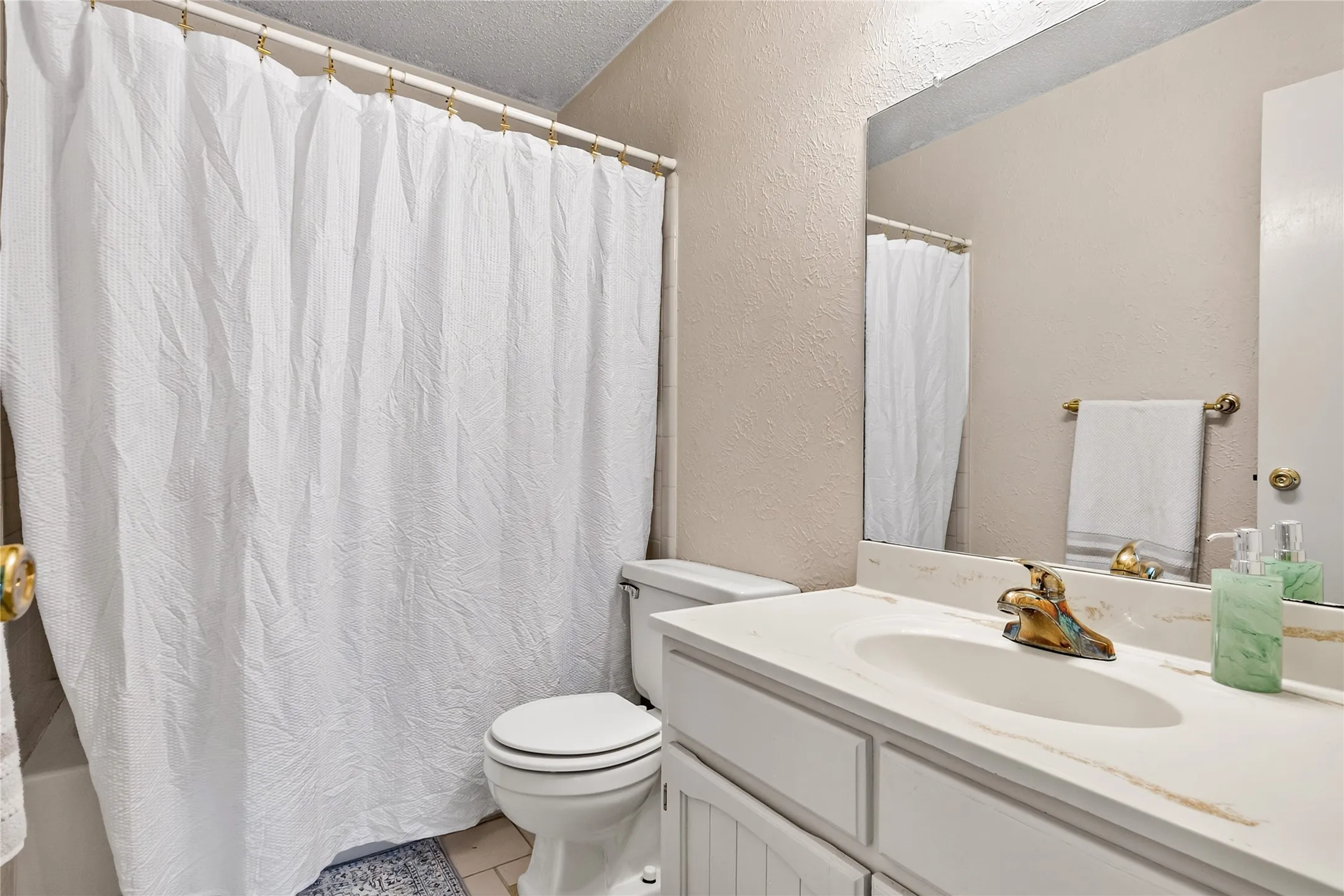 Upstairs Bathtub/Shower Combo.