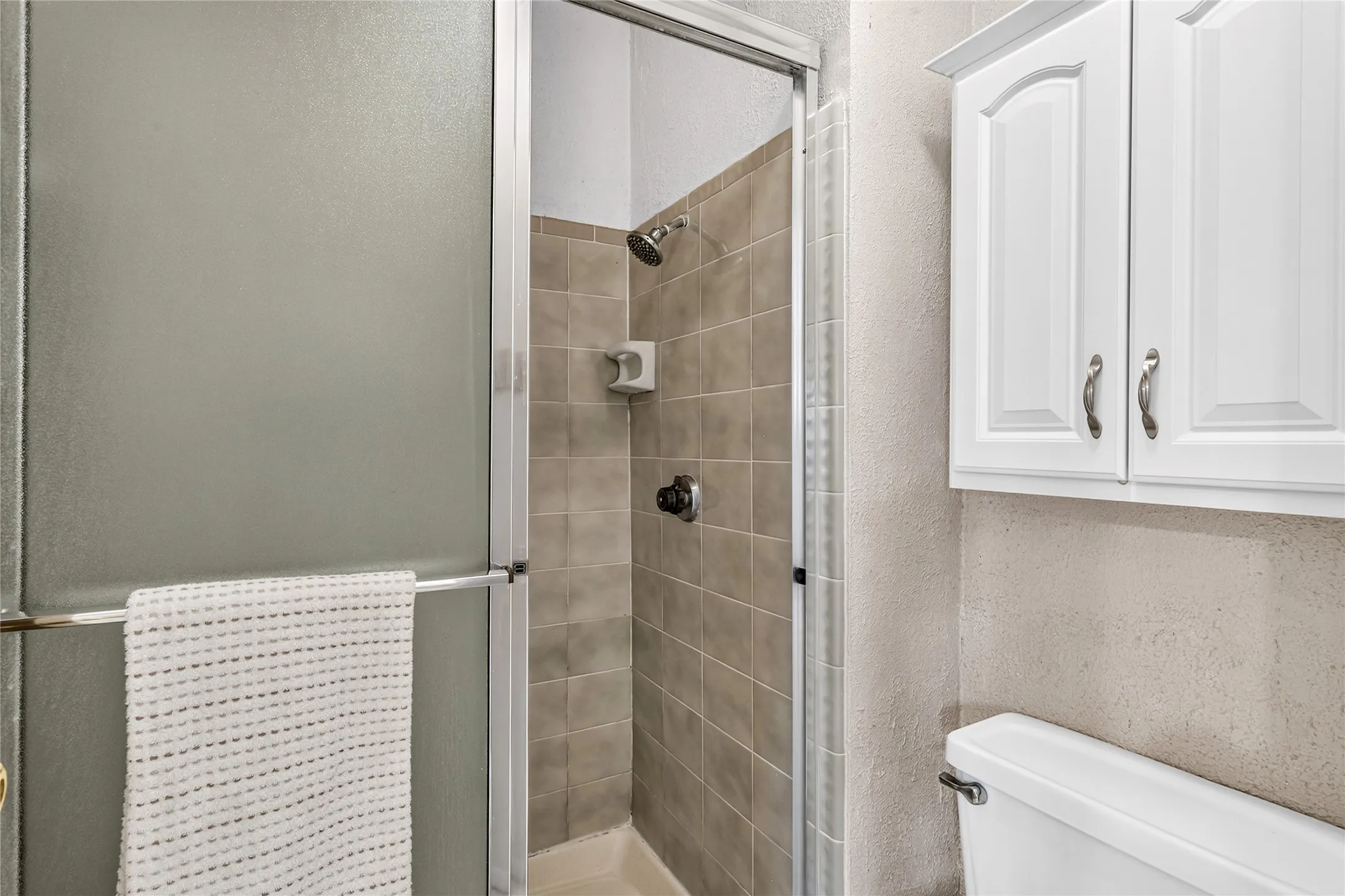 Separate room for shower and toilet for privacy.