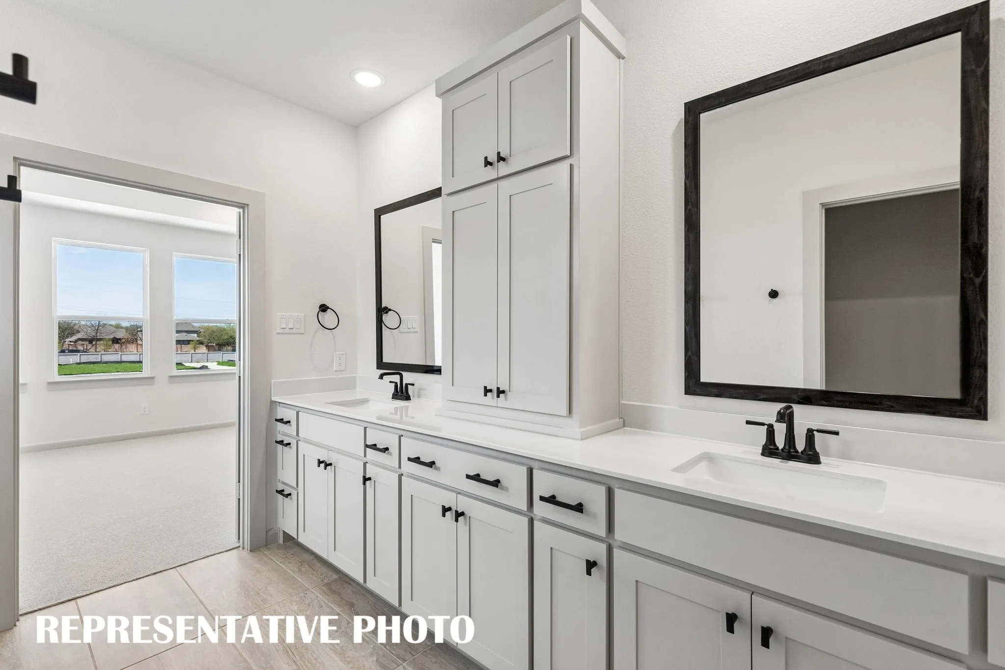 Ample rooms for two in this wonderful owner's bath.  REPRESENTATIVE PHOTO