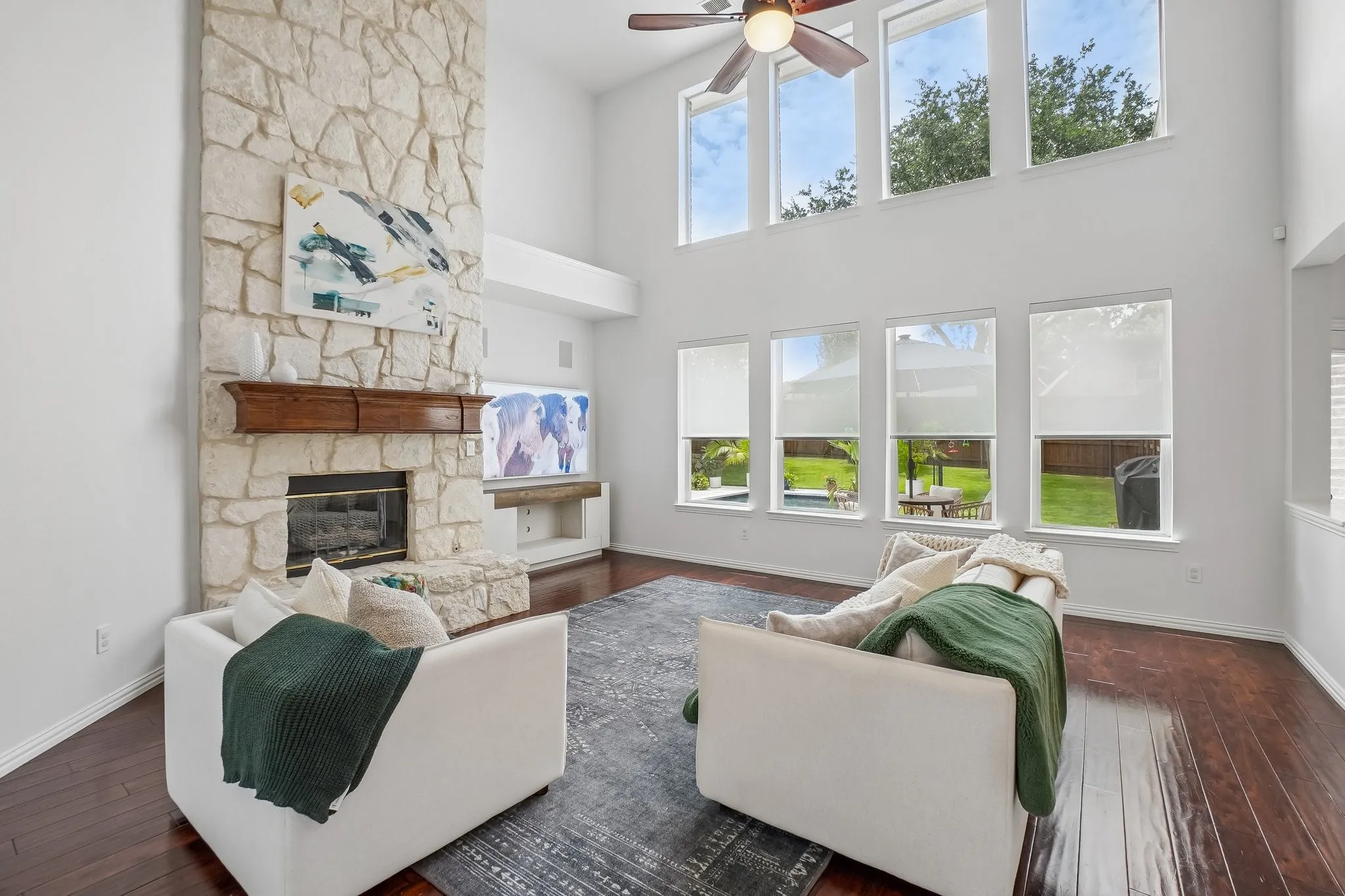 Family room with electric shades