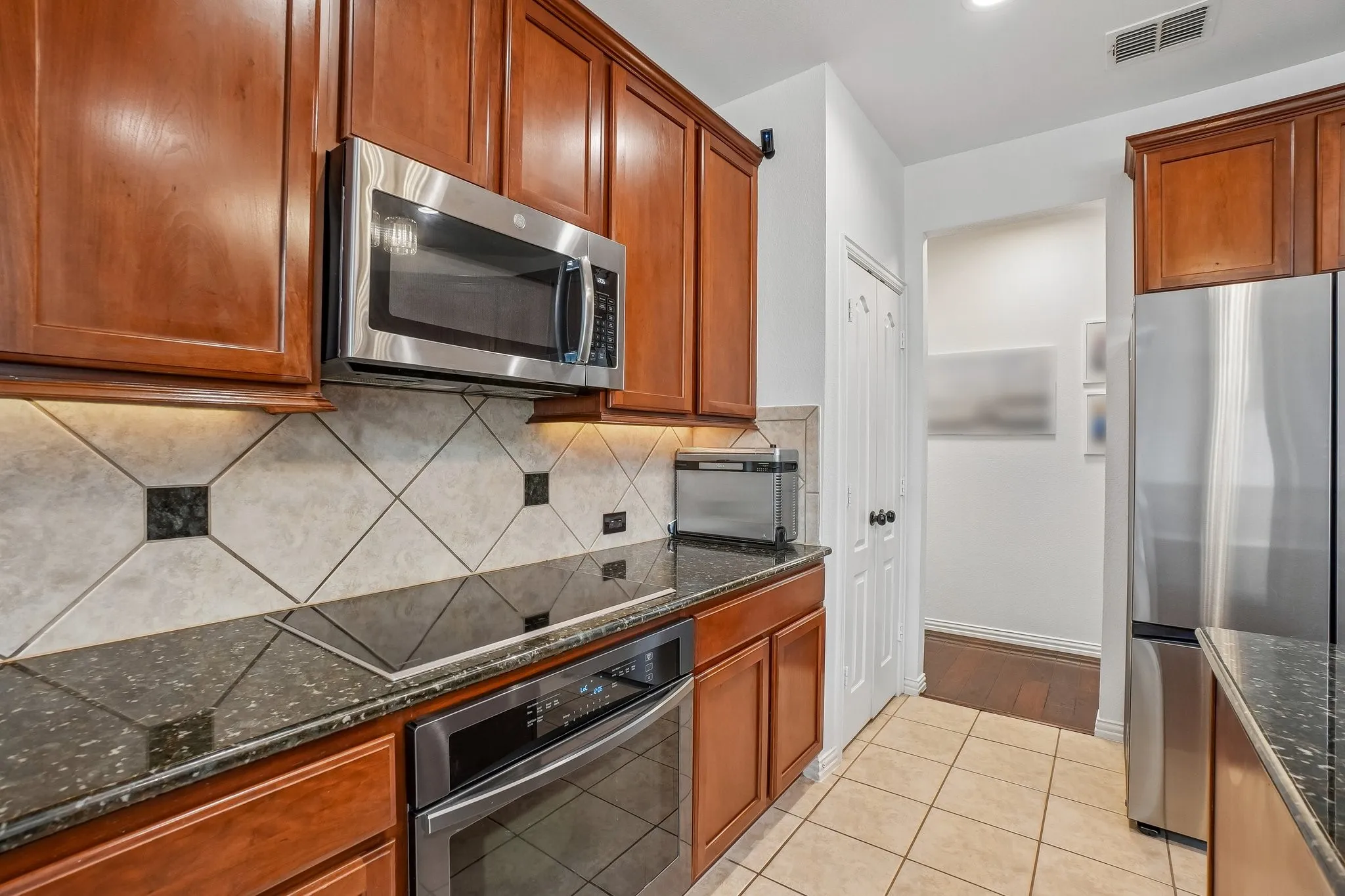 Stainless steel appliance. Fridge stays