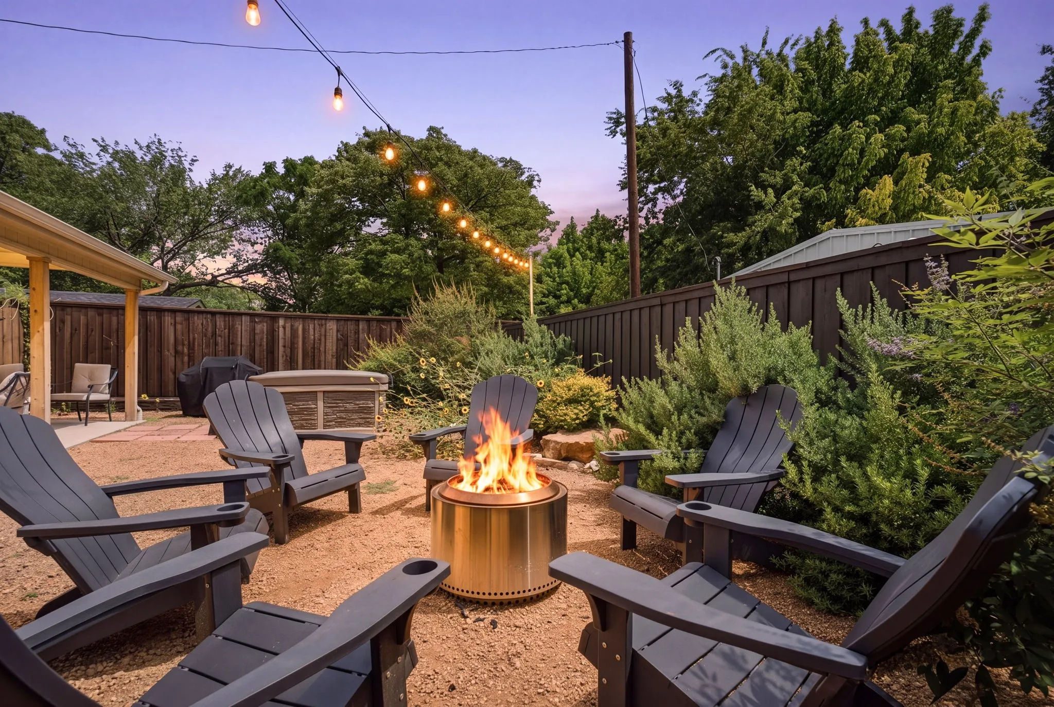 backyard fire pit area with spa