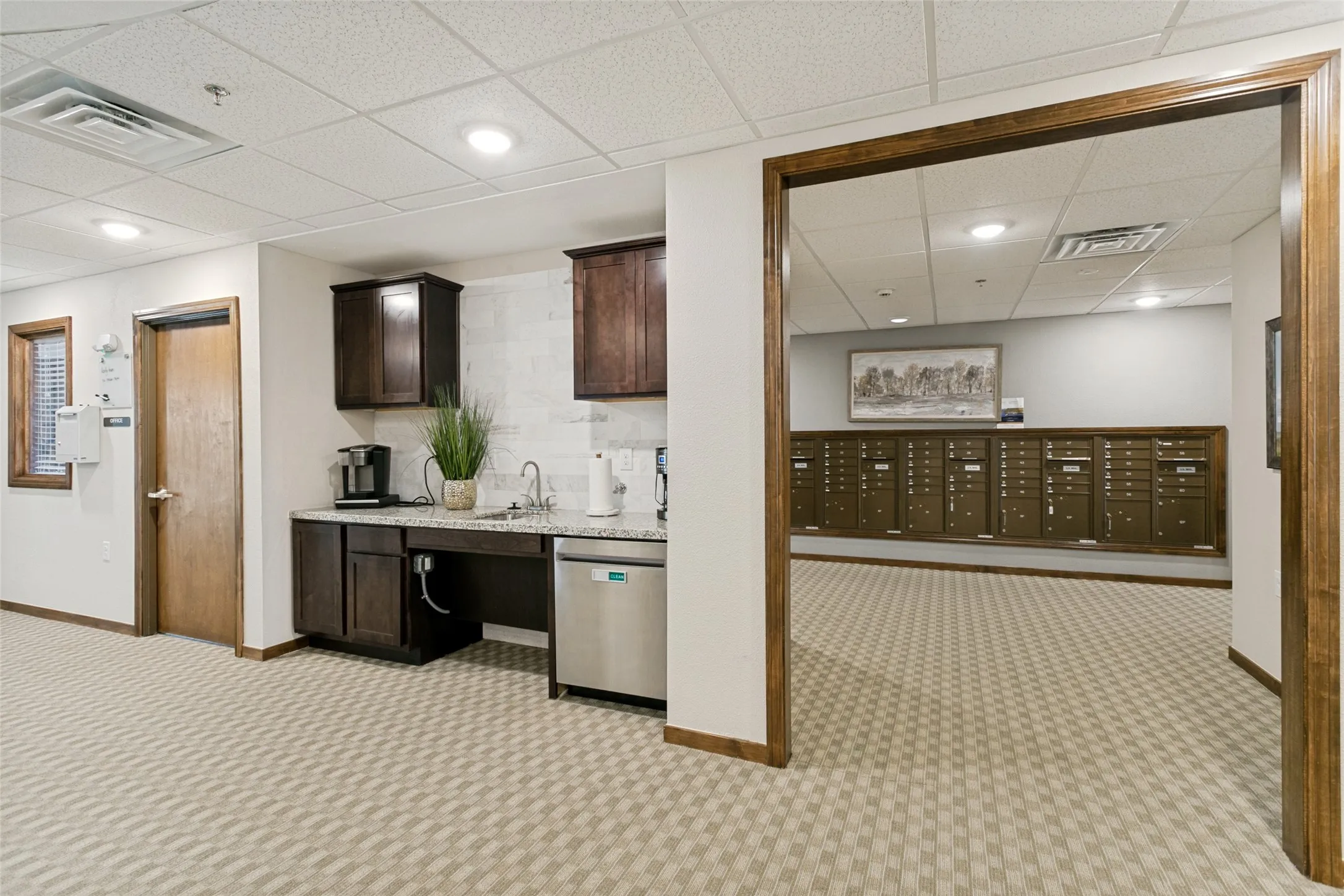 A view of the community coffee bar and mail room.