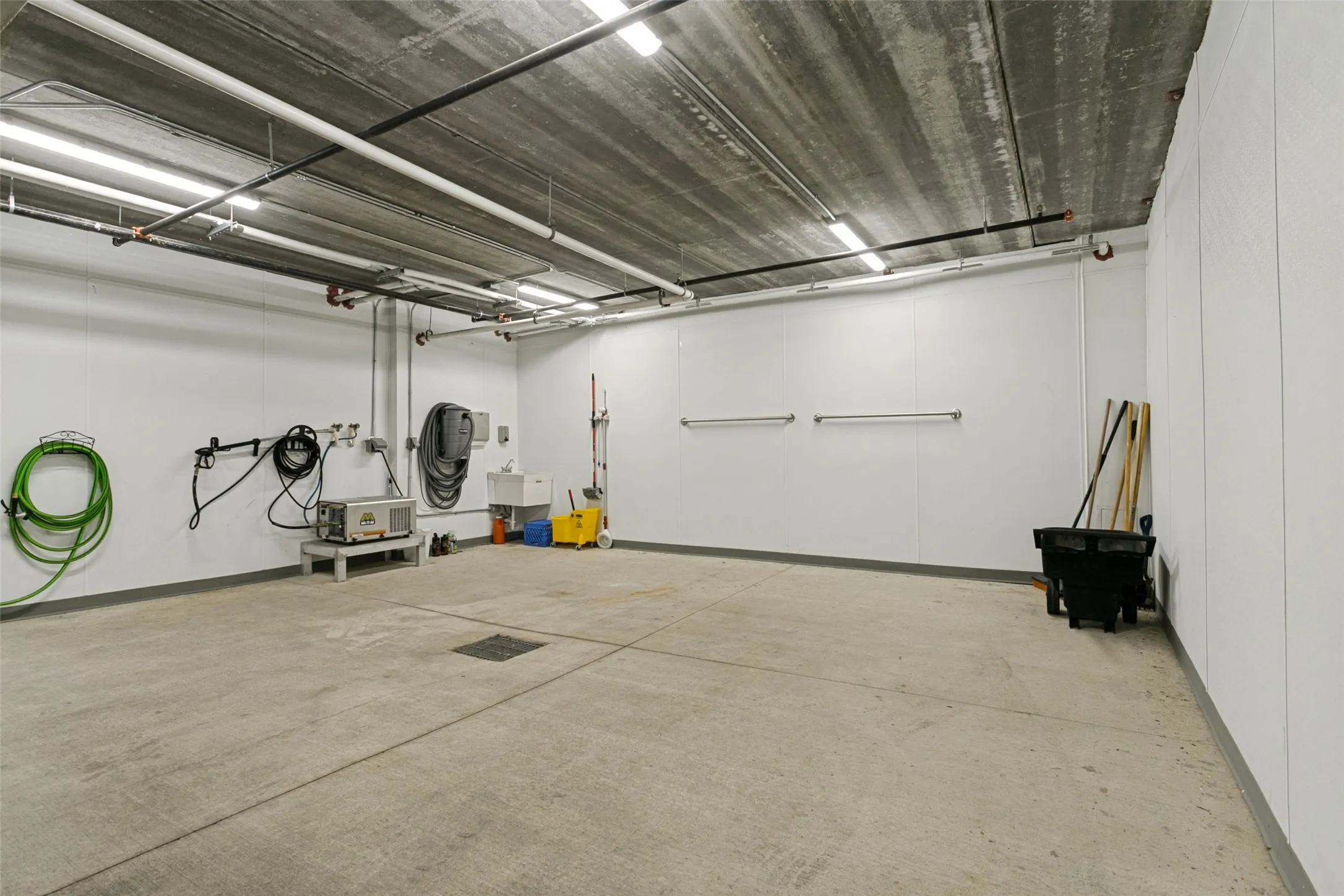 The garage is climate controlled and features a car wash bay.