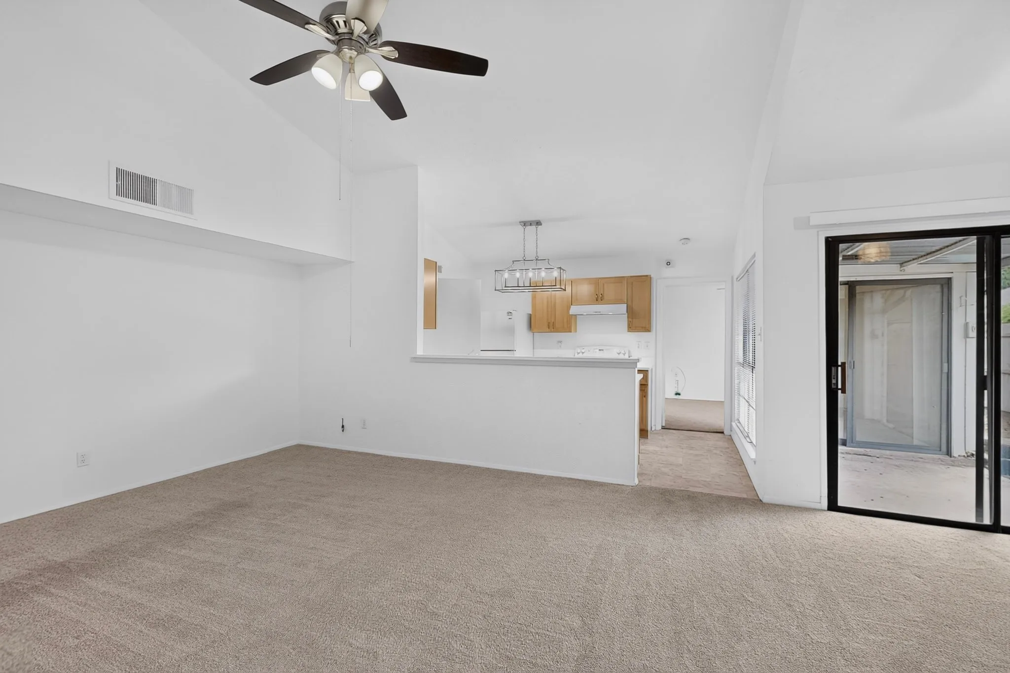 View into the open kitchen and patio access