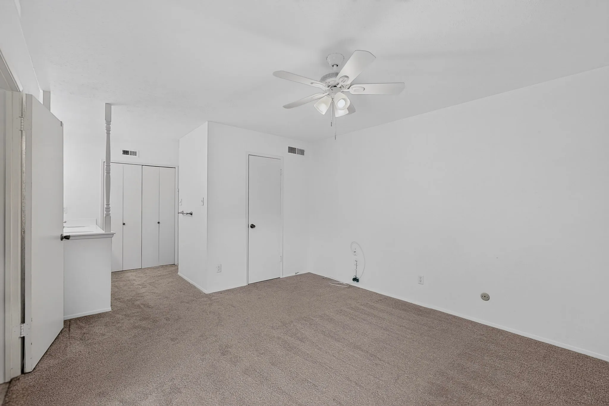 Primary bedroom has two closets