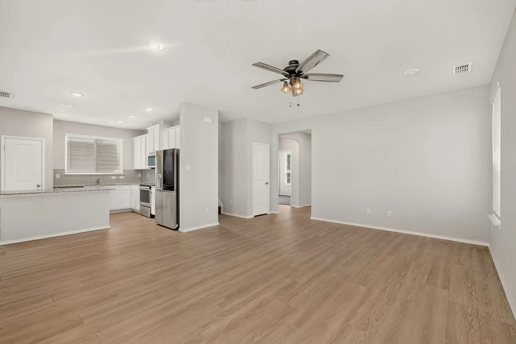 Living room opens to kitchen