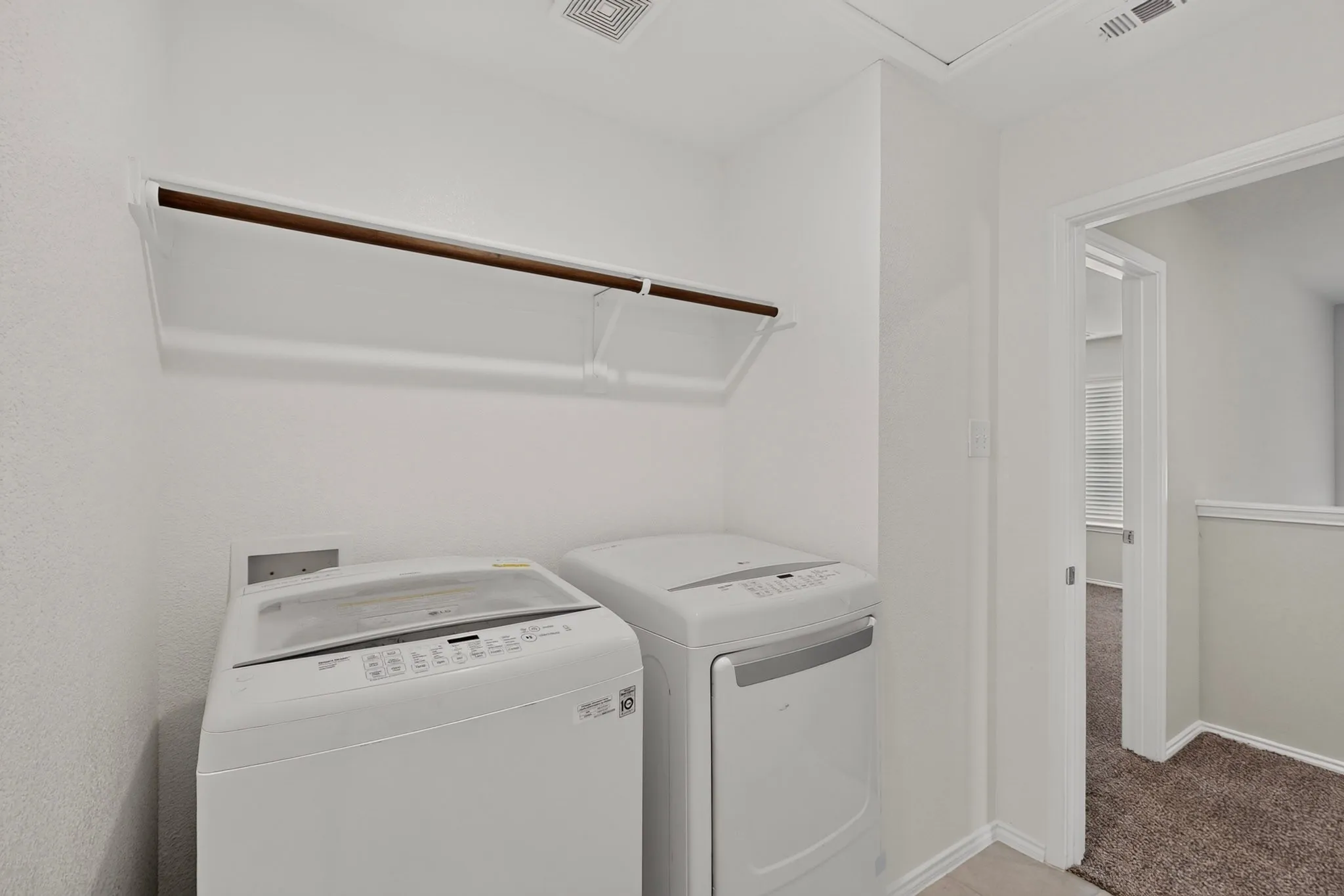 Separate and spacious laundry room
