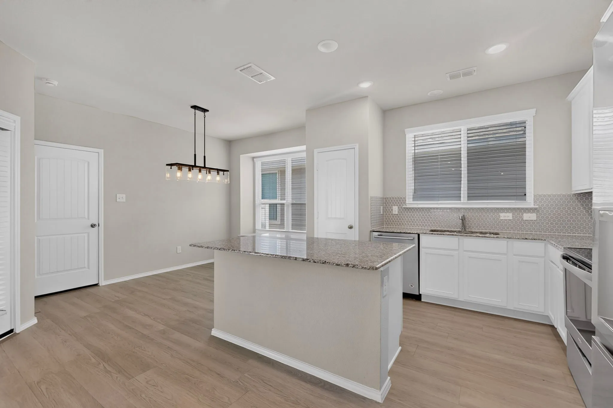 Bright and beautiful kitchen with large island